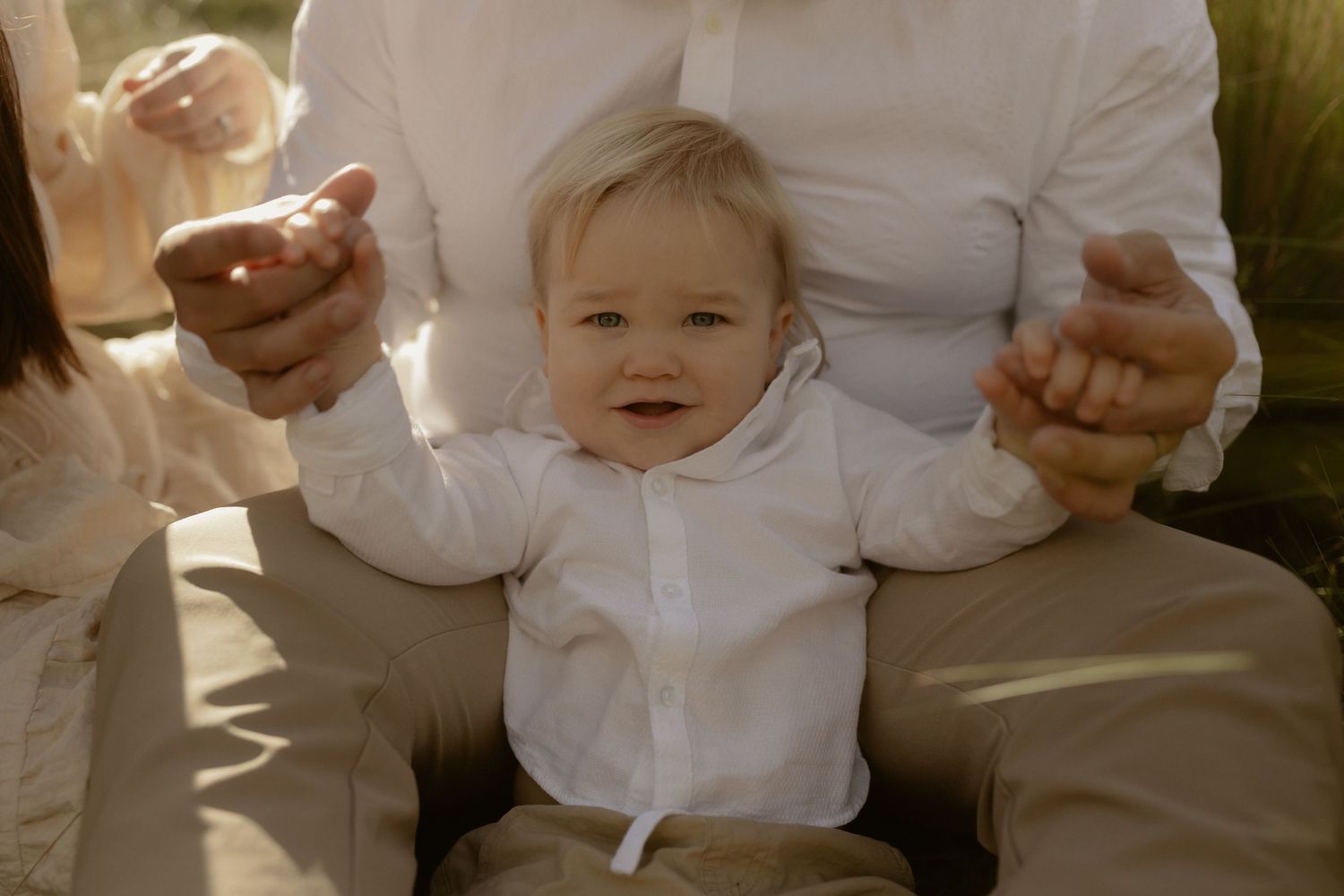 A collection of candid photos showing people in white clothing sitting together and sharing happy moments.