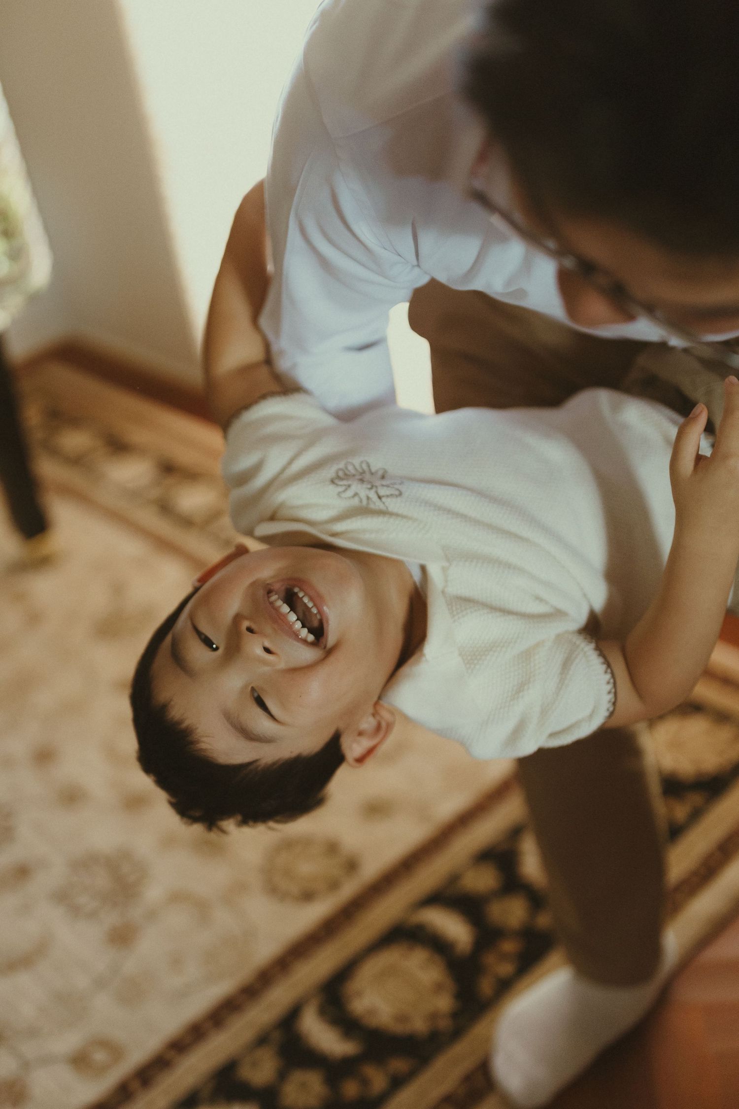 A playful moment captured in a candid lifestyle photoshoot.