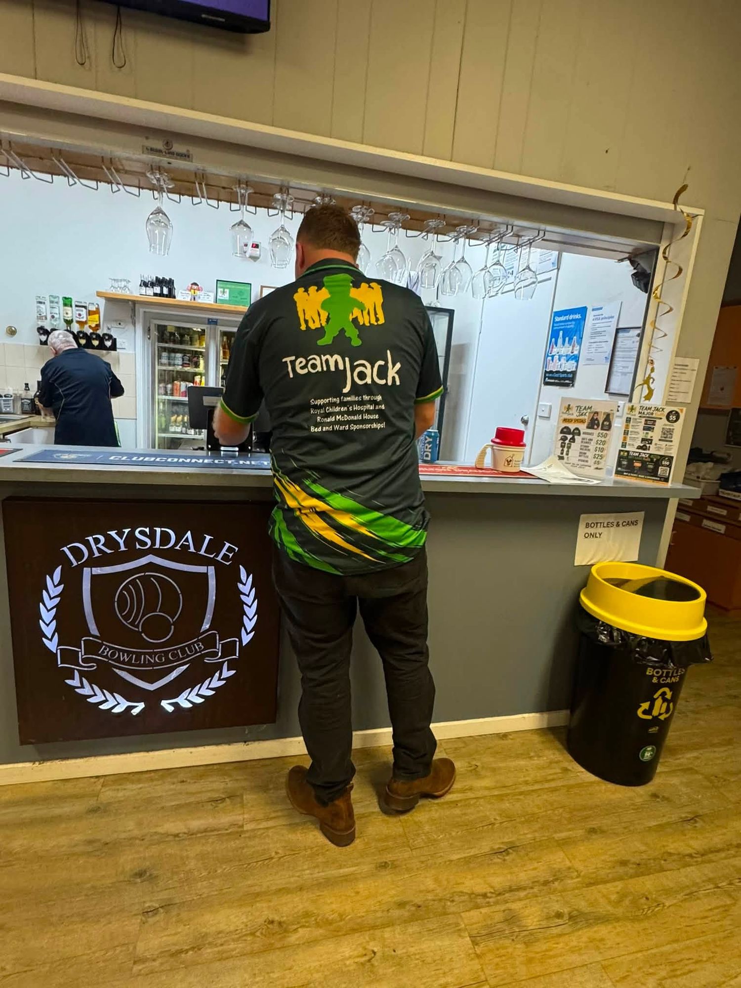 A Team Jack polo shirt at the Drysdale Bowls Club bar, reading 