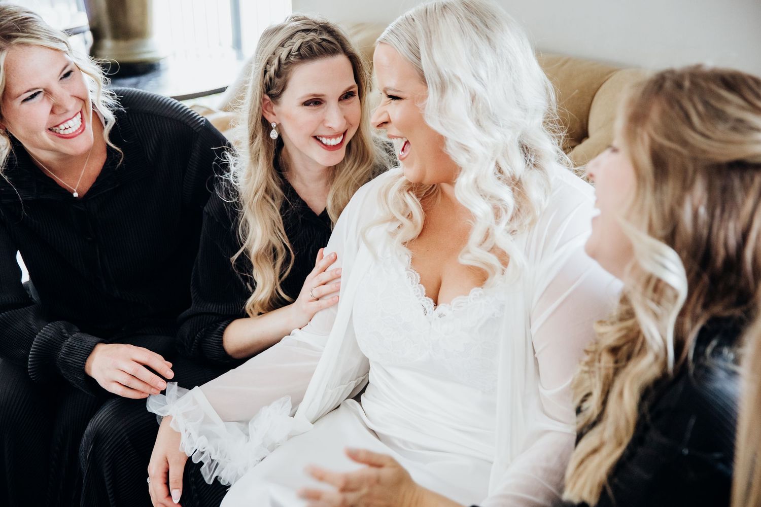 A series of candid wedding preparation moments showing people getting ready in white robes and formal attire.