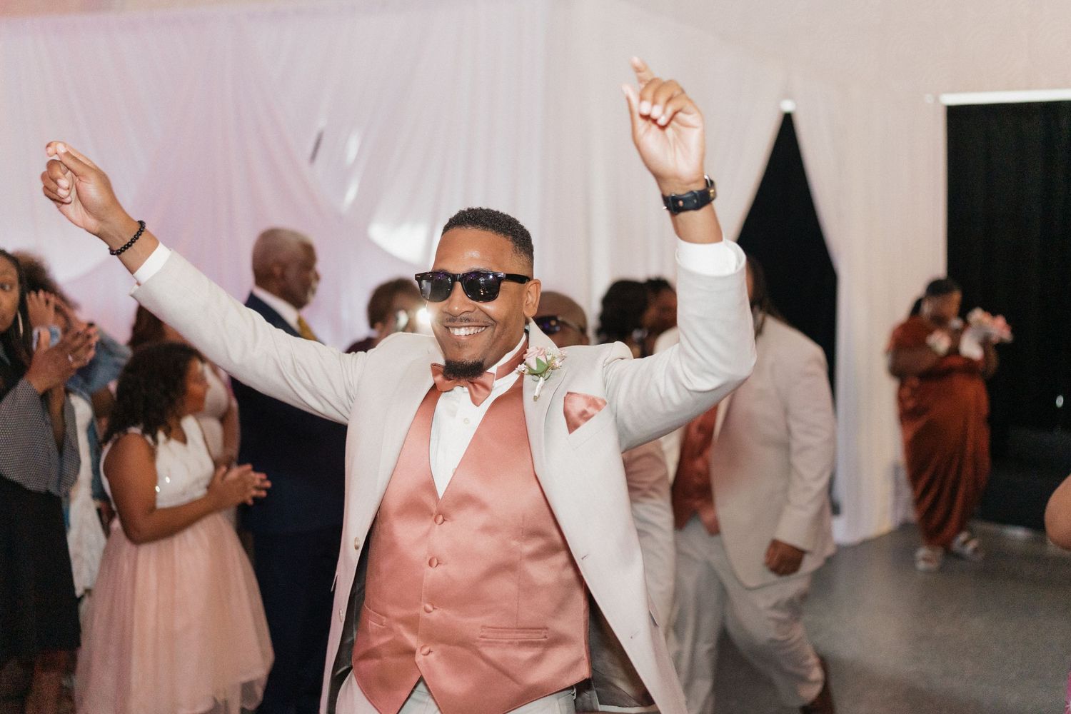 Energetic wedding reception dancing captured in a sequence of joyful moments.