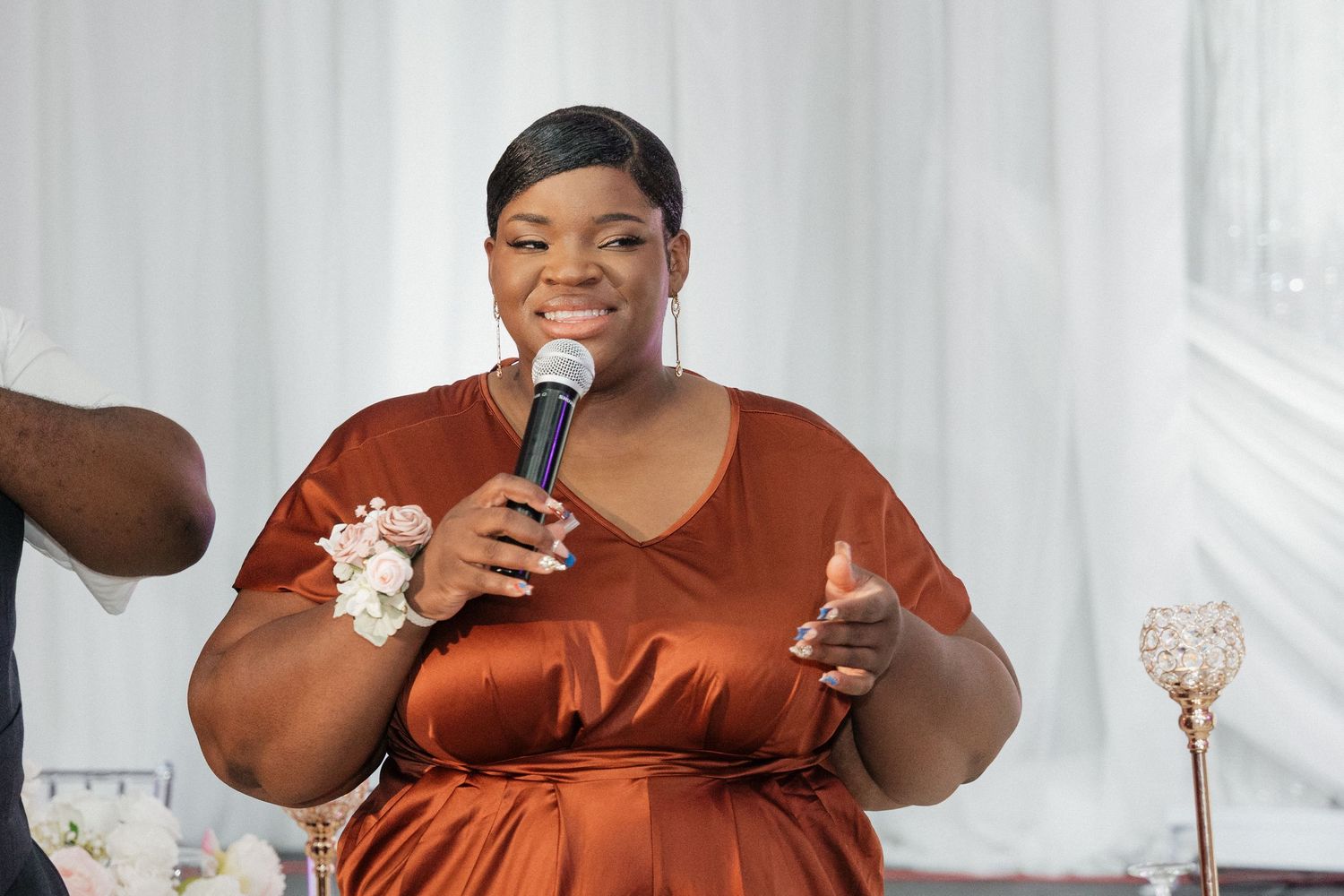 Emotional wedding reception moments captured during speeches and toasts.