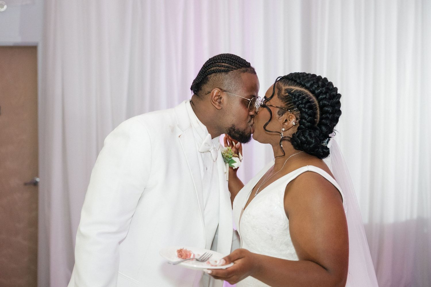 Newlyweds share a sweet moment during their wedding reception.
