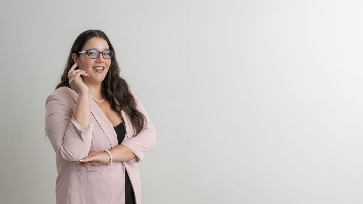 Professional lifestyle portrait series showing different poses and expressions in a light studio setting with neutral background.