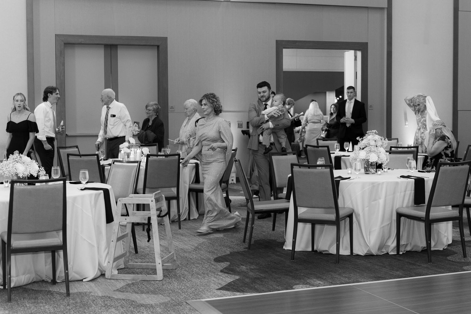 A panoramic black and white photo sequence showing a medical screening process in a clinical setting.