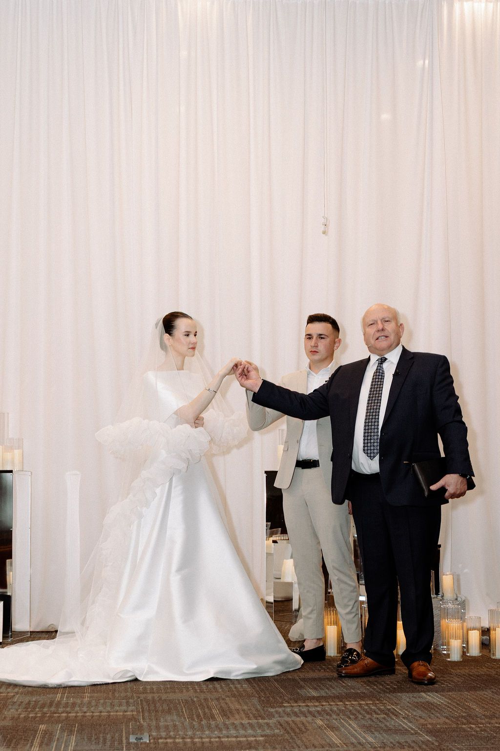 A playful series of wedding photos showing the bride twirling in her white gown with guests.