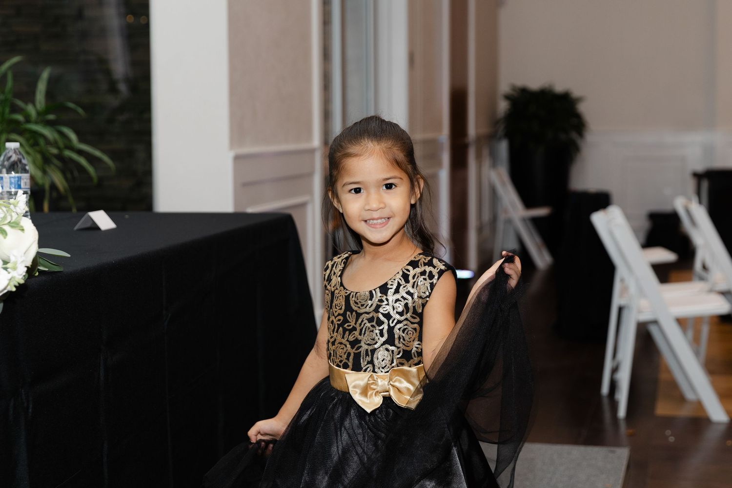 A series of photos showing someone in a black dress sitting at a piano in a well-lit room with indoor plants.