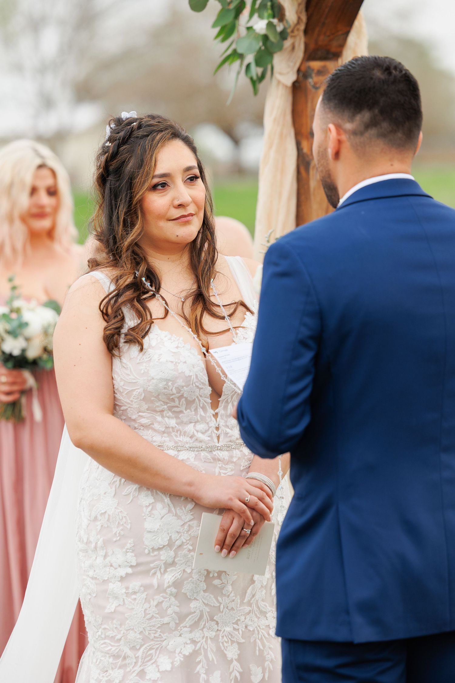 A series of wedding photos showing a couple in formal attire dancing together under an outdoor pergola.