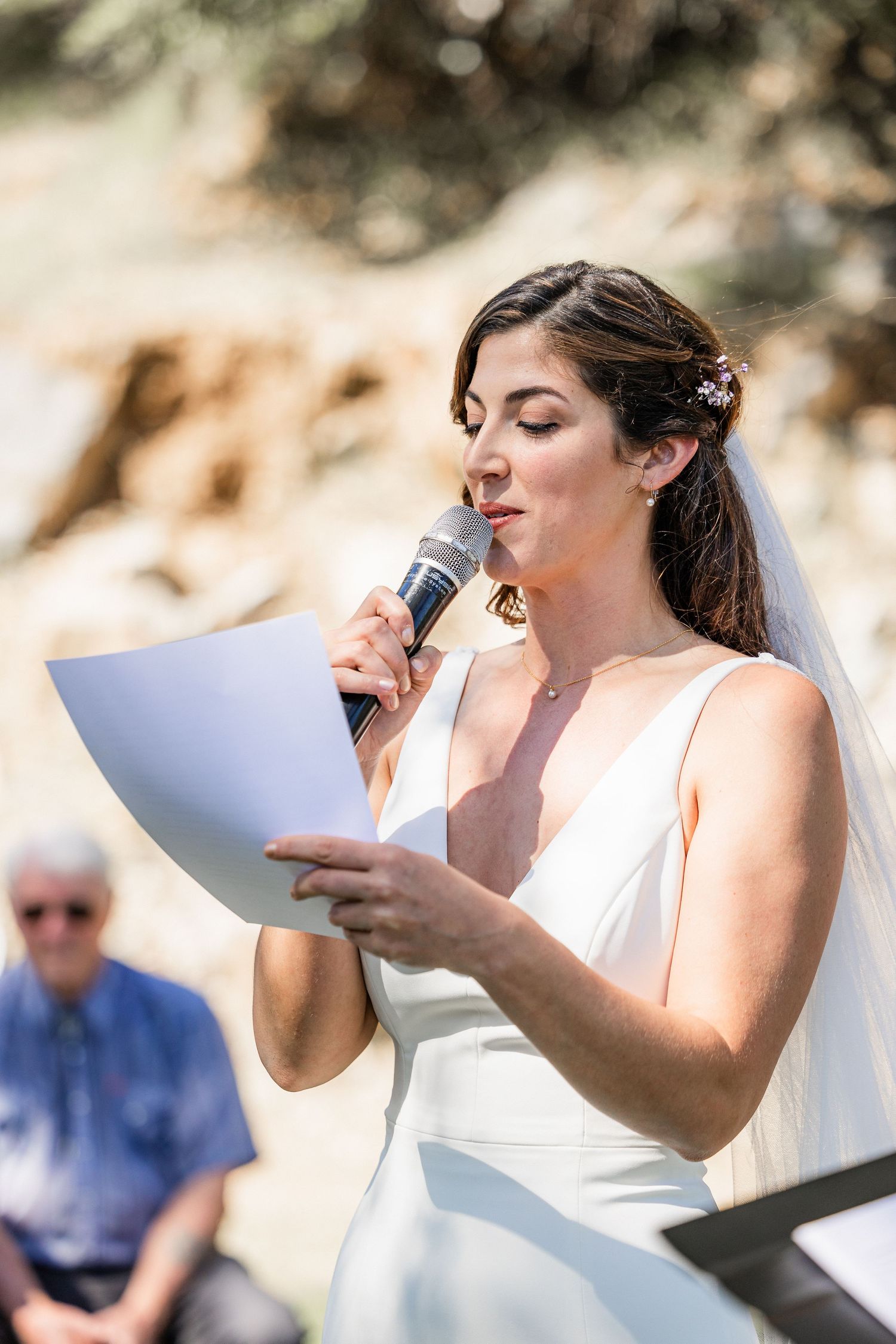 A series of photos showing a person in a white dress making silly faces while eating something outdoors.