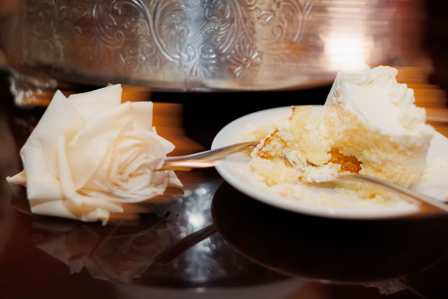 A sequence of photos showing white plates with partially eaten slices of cake in various stages of consumption.