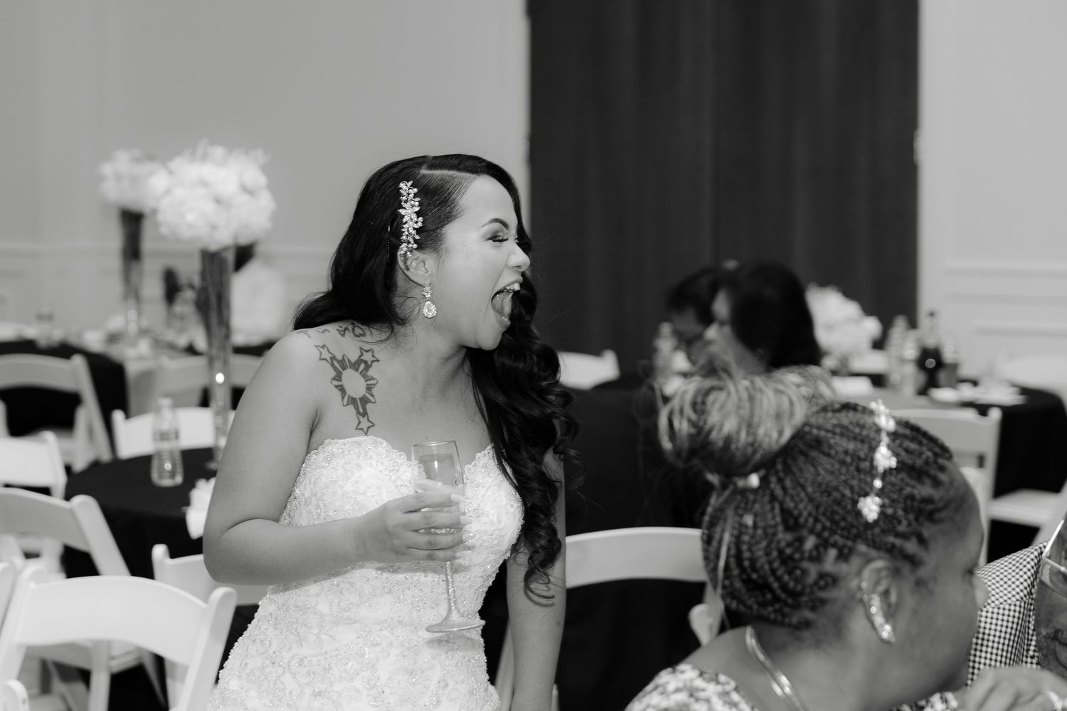 A bride and groom share their first dance together at an elegant wedding reception.