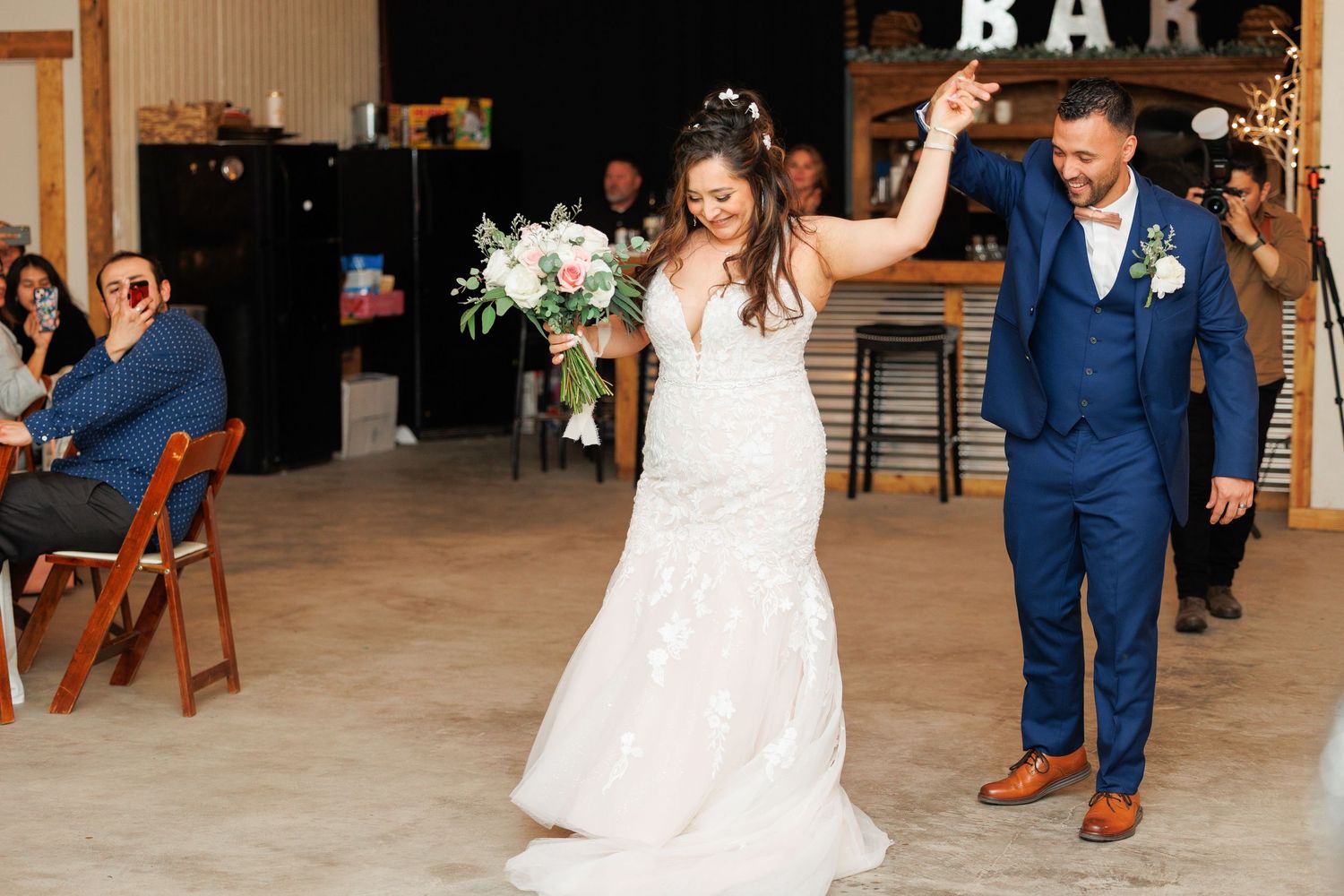 Collage of wedding reception photos showing dancing, celebration and decor in a rustic venue.