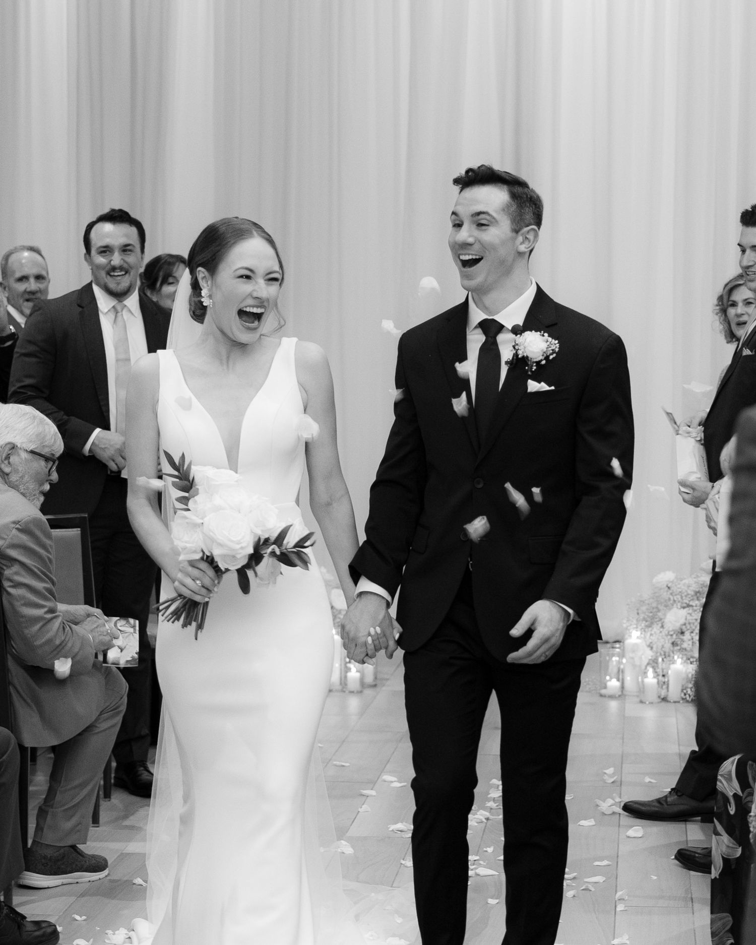 Wedding party members laugh joyfully in a candid black and white photo sequence showing genuine emotion and celebration.