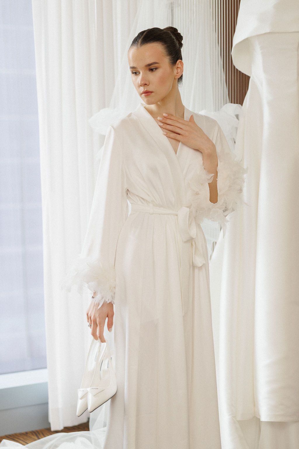 Elegant white wedding robe captured in multiple angles with soft natural lighting.