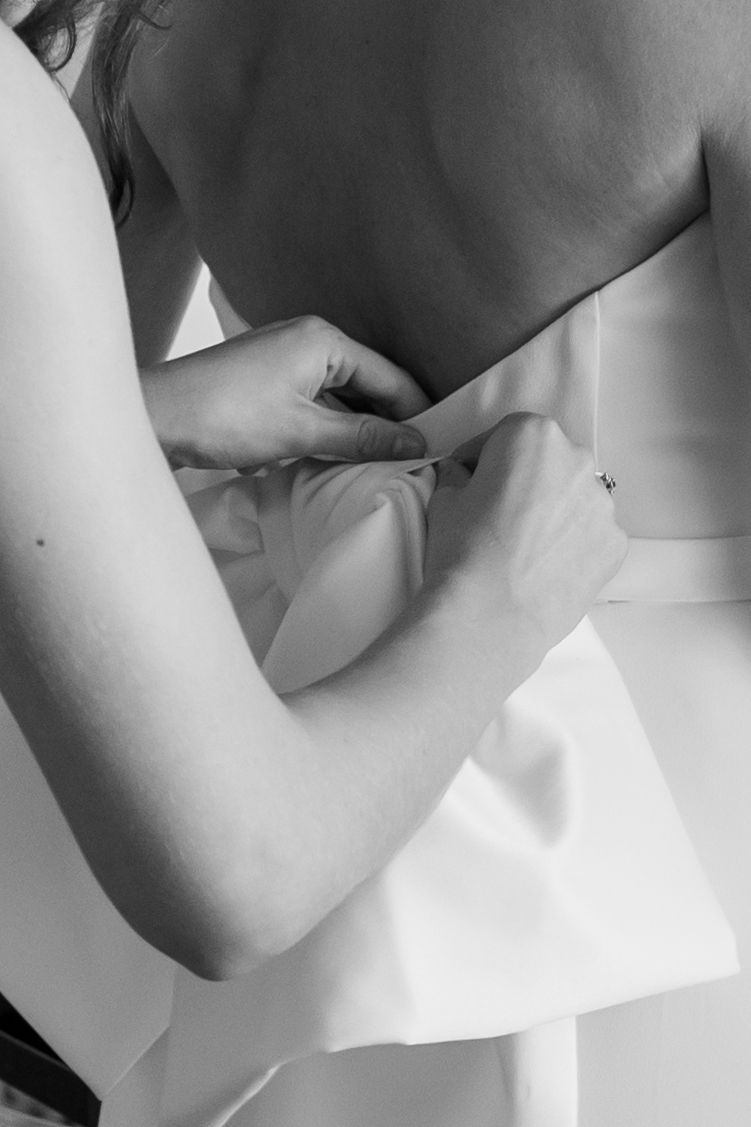 A series of black and white artistic photographs showing close-up details of bare shoulders and arms.