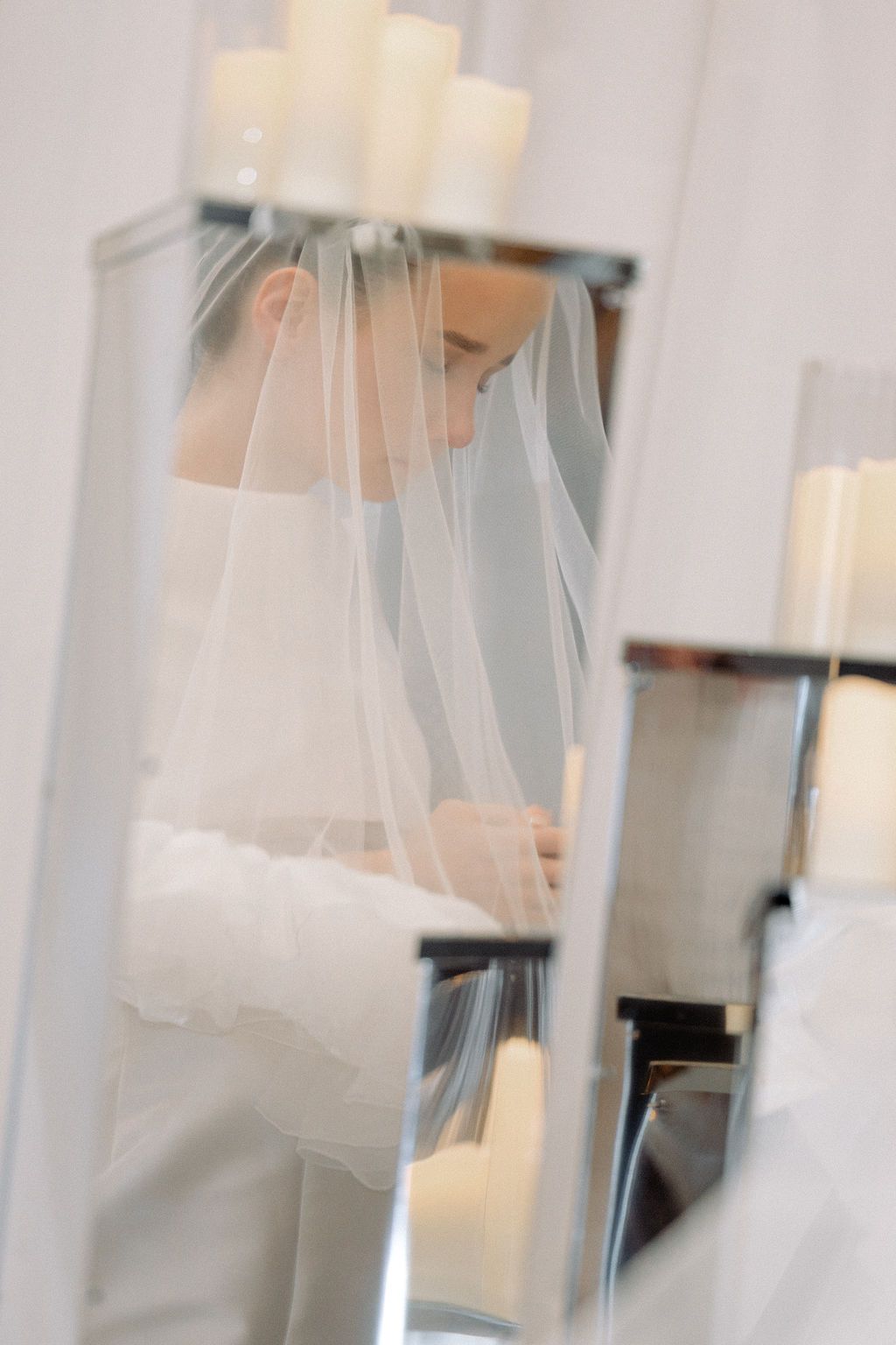 A series of ethereal bridal portraits with soft lighting and flowing white veil.