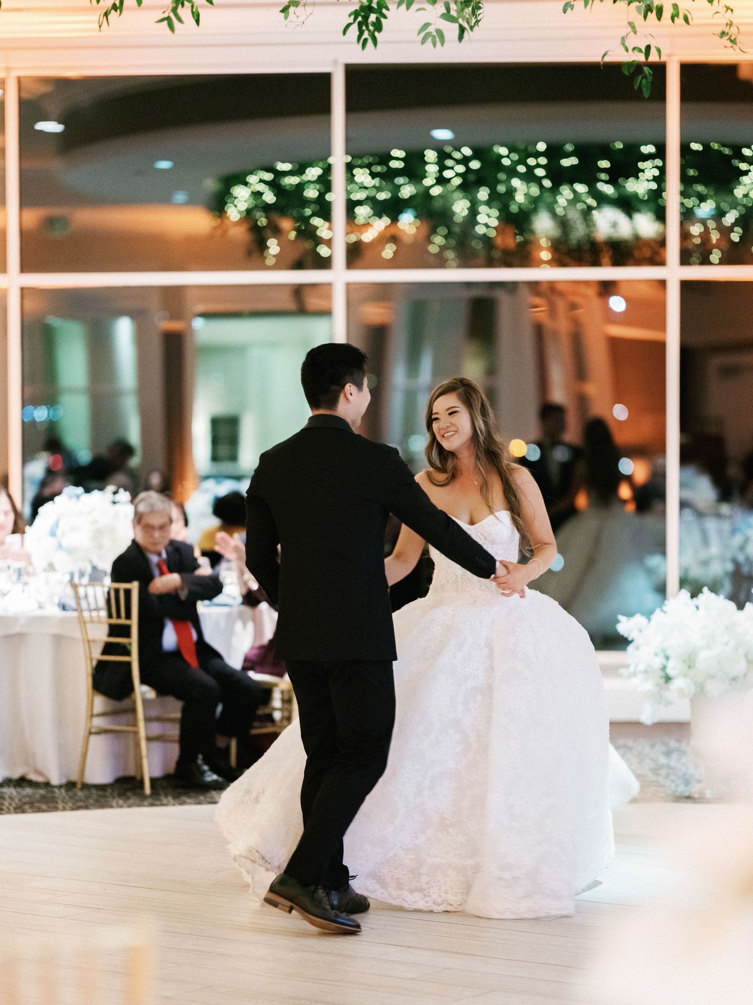 Wedding reception dance floor sequence showing guests dancing in formal attire.