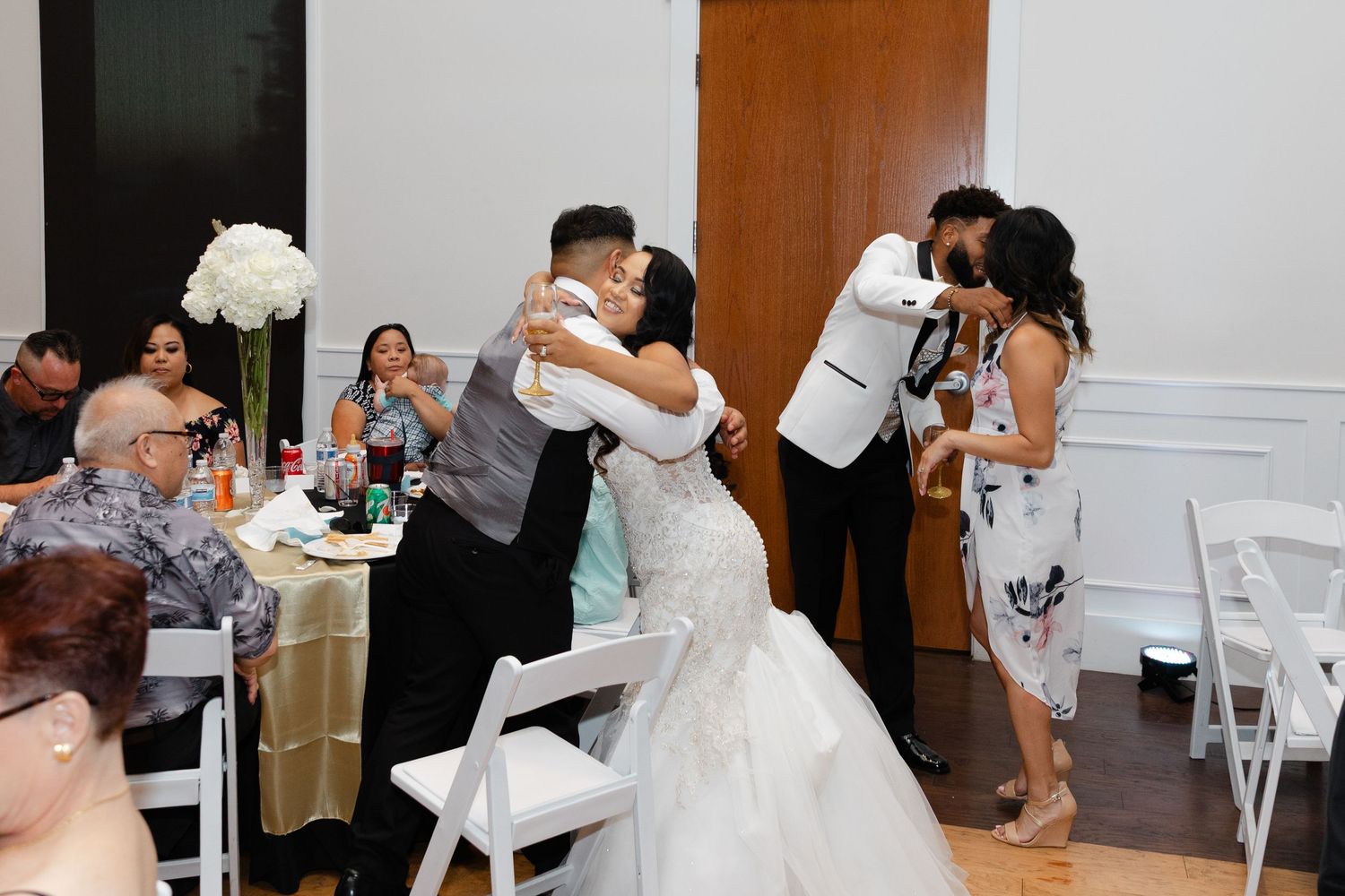 A collage of wedding reception moments showing guests dancing and celebrating at an elegant indoor venue.