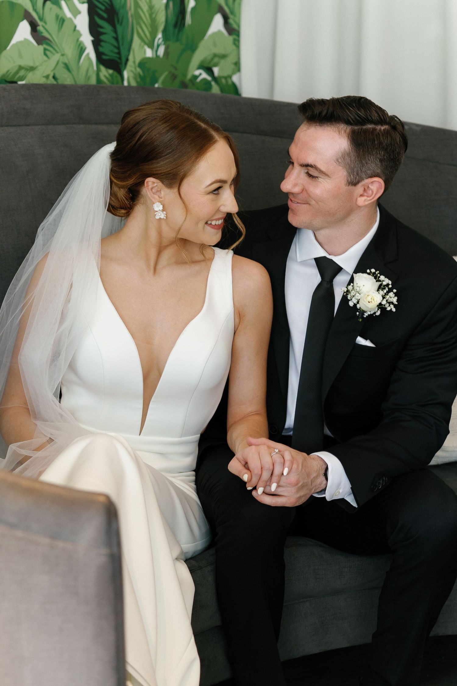 A bride and groom share intimate moments in a series of black and white wedding photos.