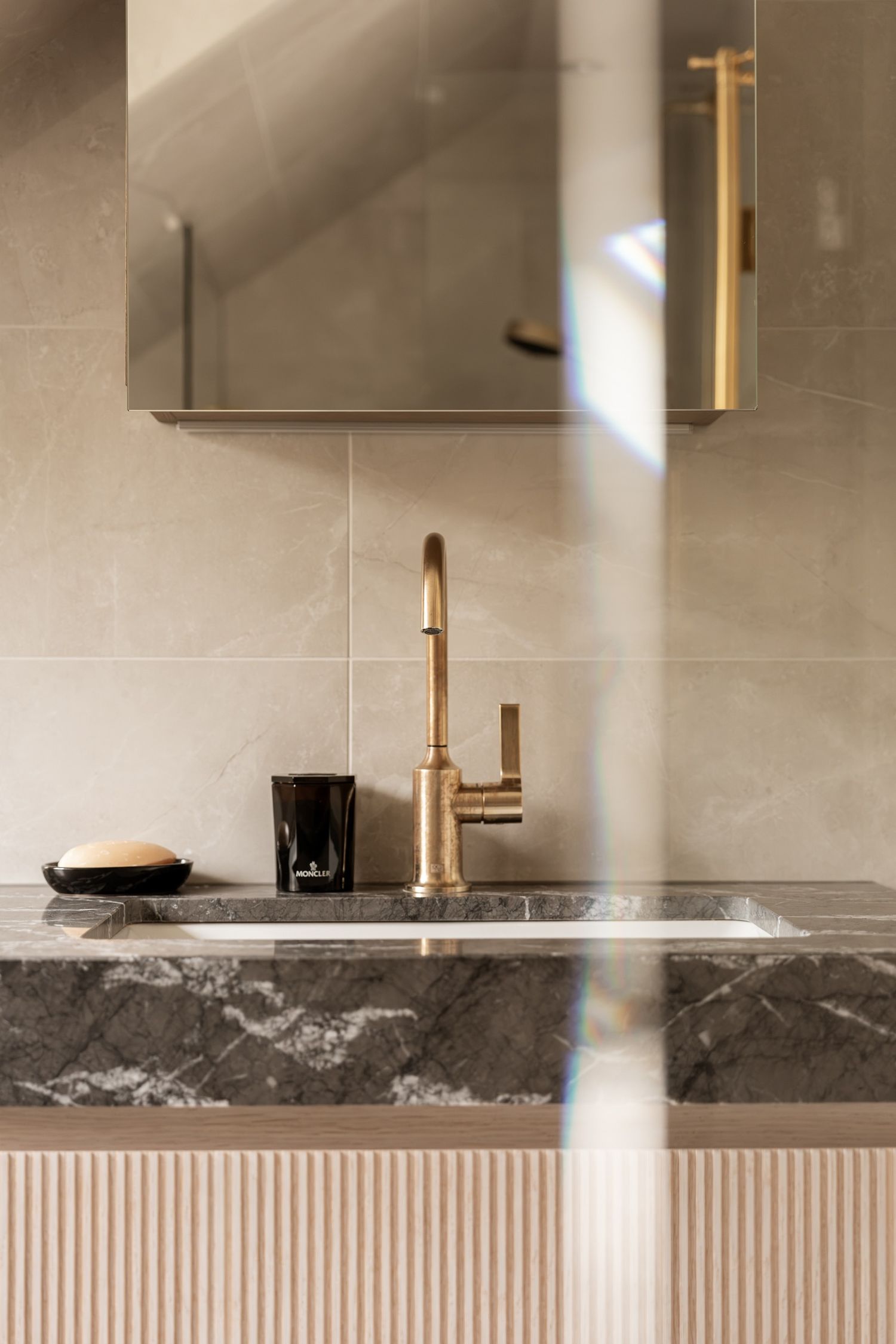 Bathroom tap and stone basin top
