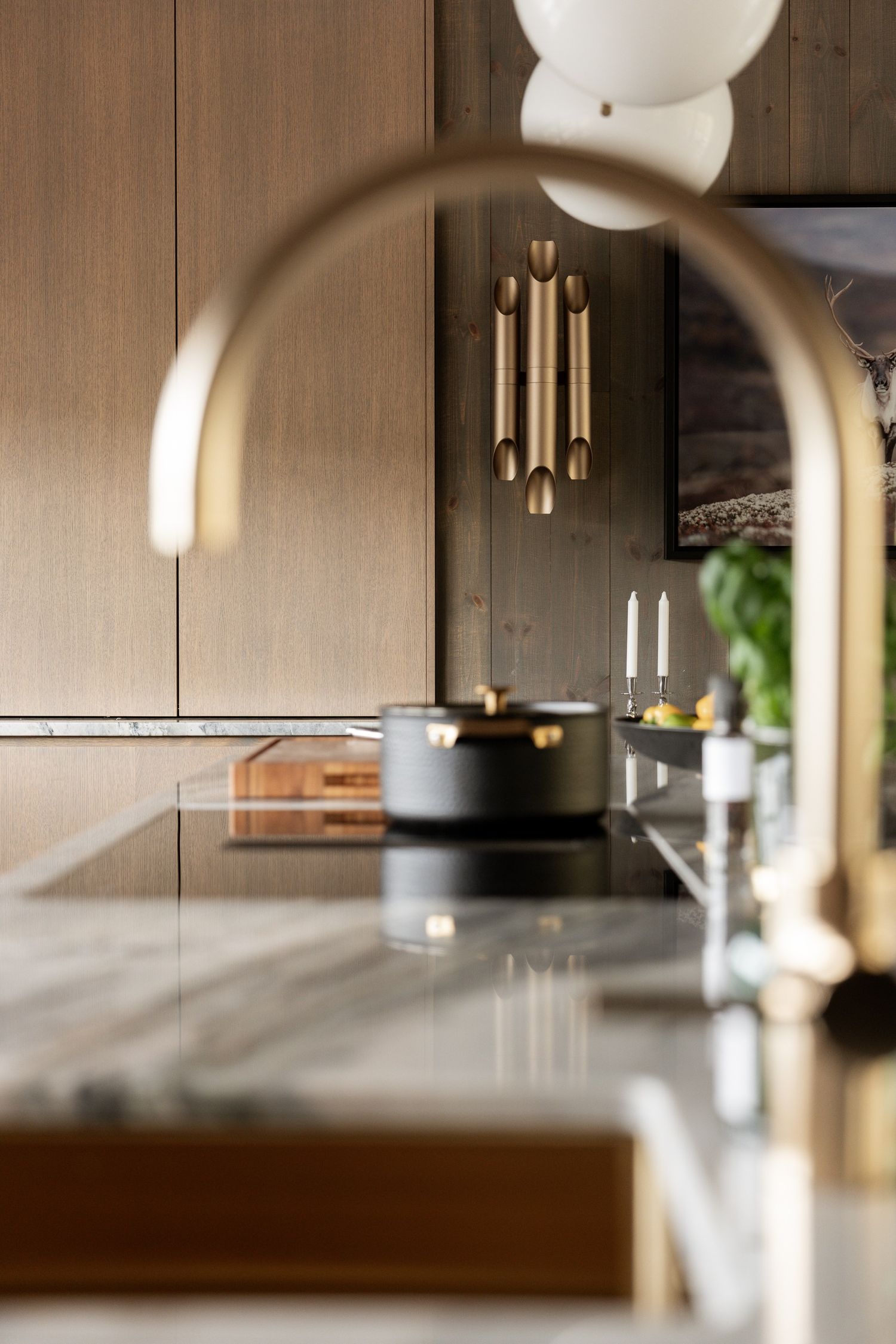 Close view of tap and stone worktop
