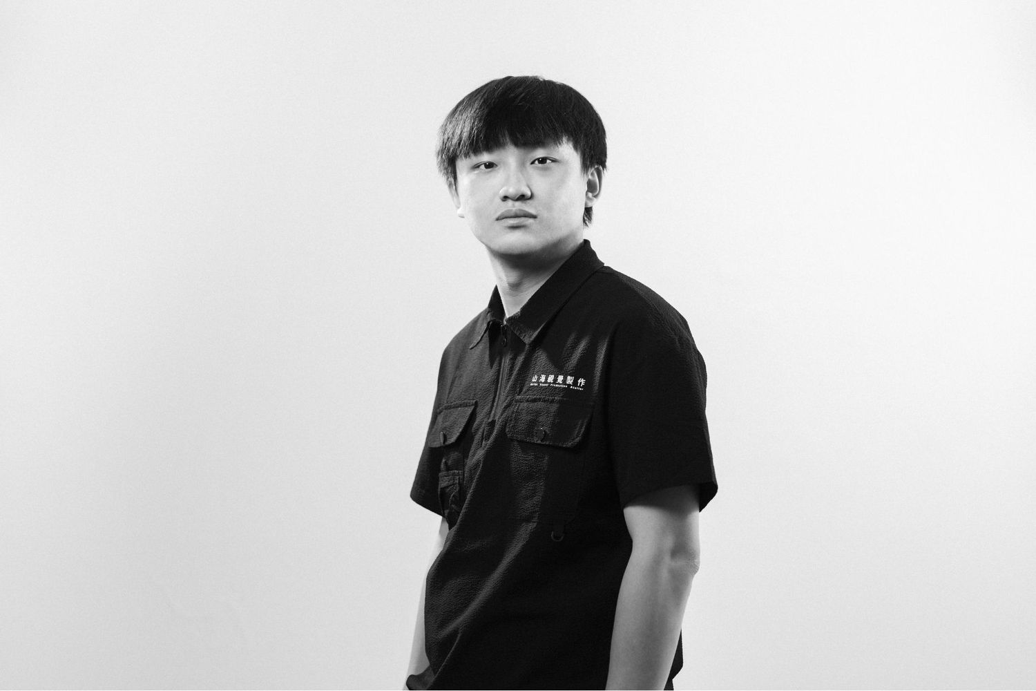 Three black and white profile portraits of someone wearing a black t-shirt against a white background.