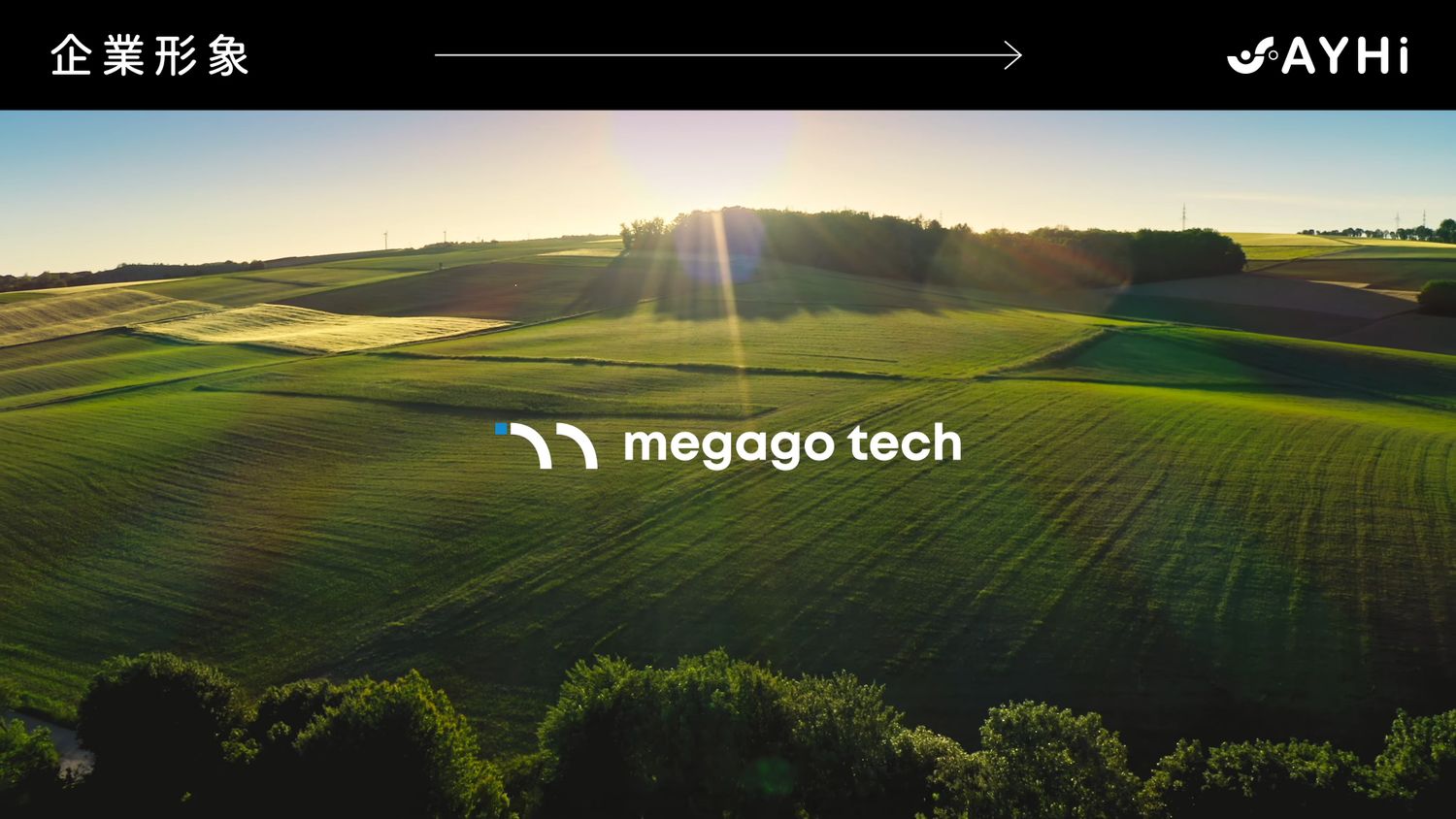 Aerial view of lush green farmland at sunset with Megago Tech company logo overlay.