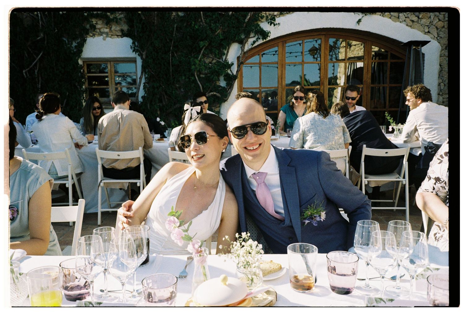 bride and groom portraits at dinner in almiral de la font in sitges