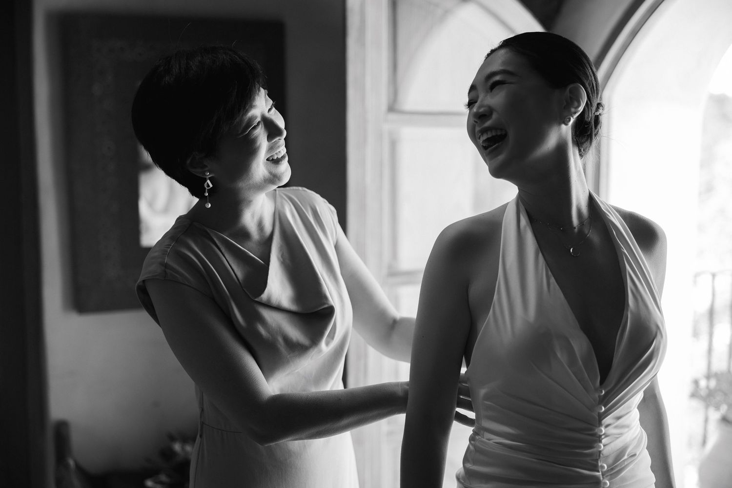 Bride getting ready with her mother