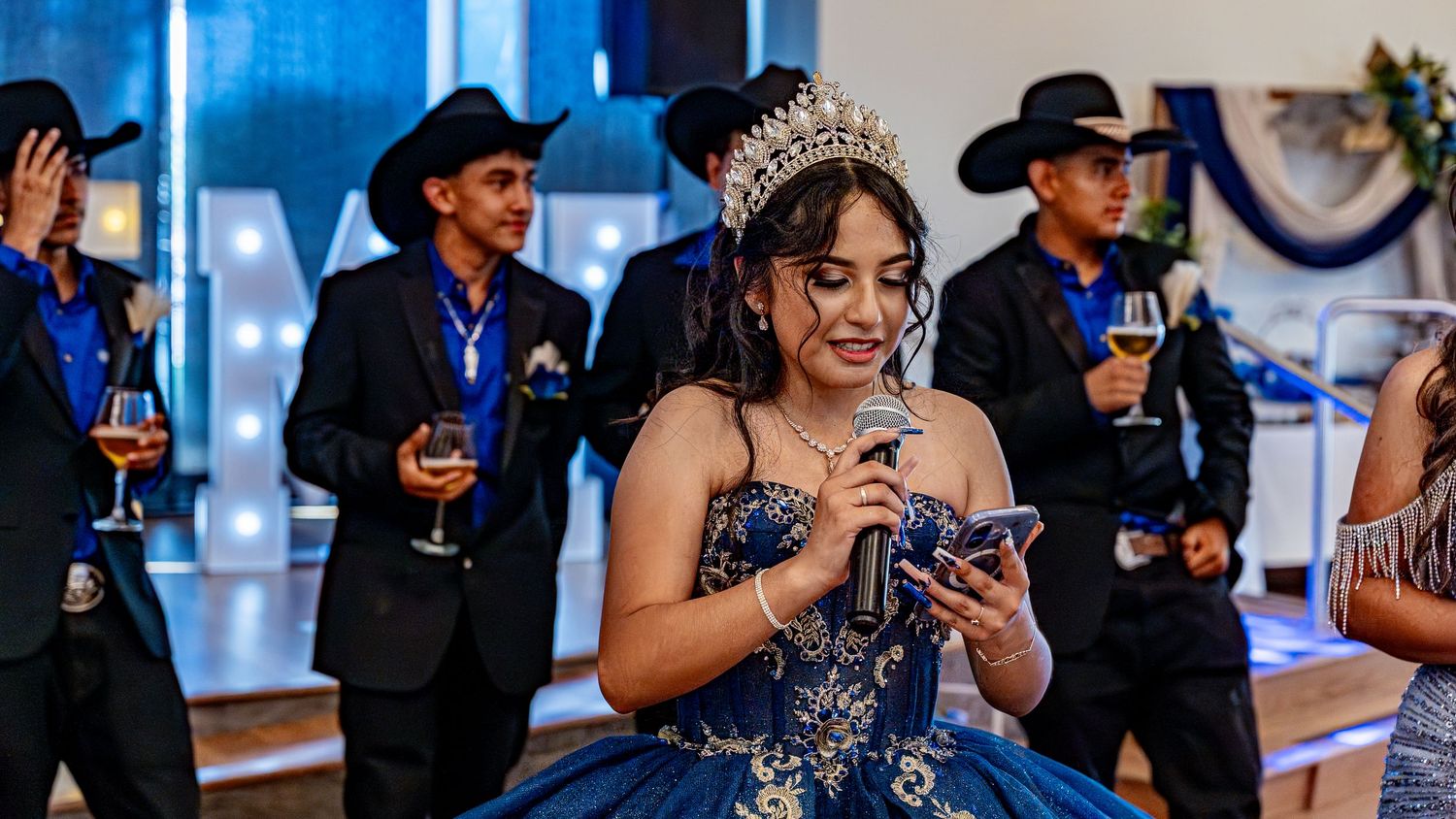 Celebratory dance moments captured in sequence at an elegant indoor venue.