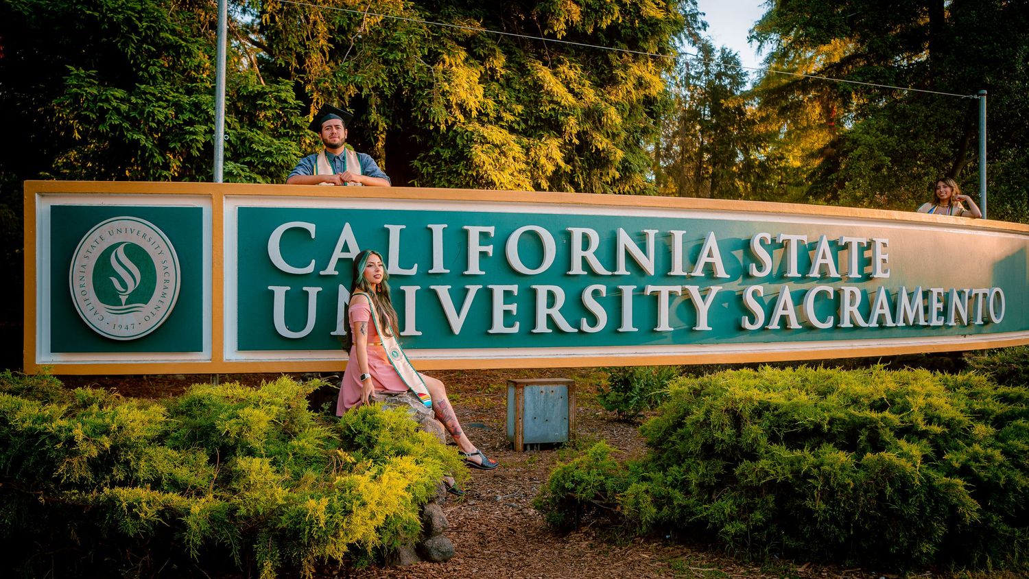 California State University Sacramento campus entrance sign with landscaping.
