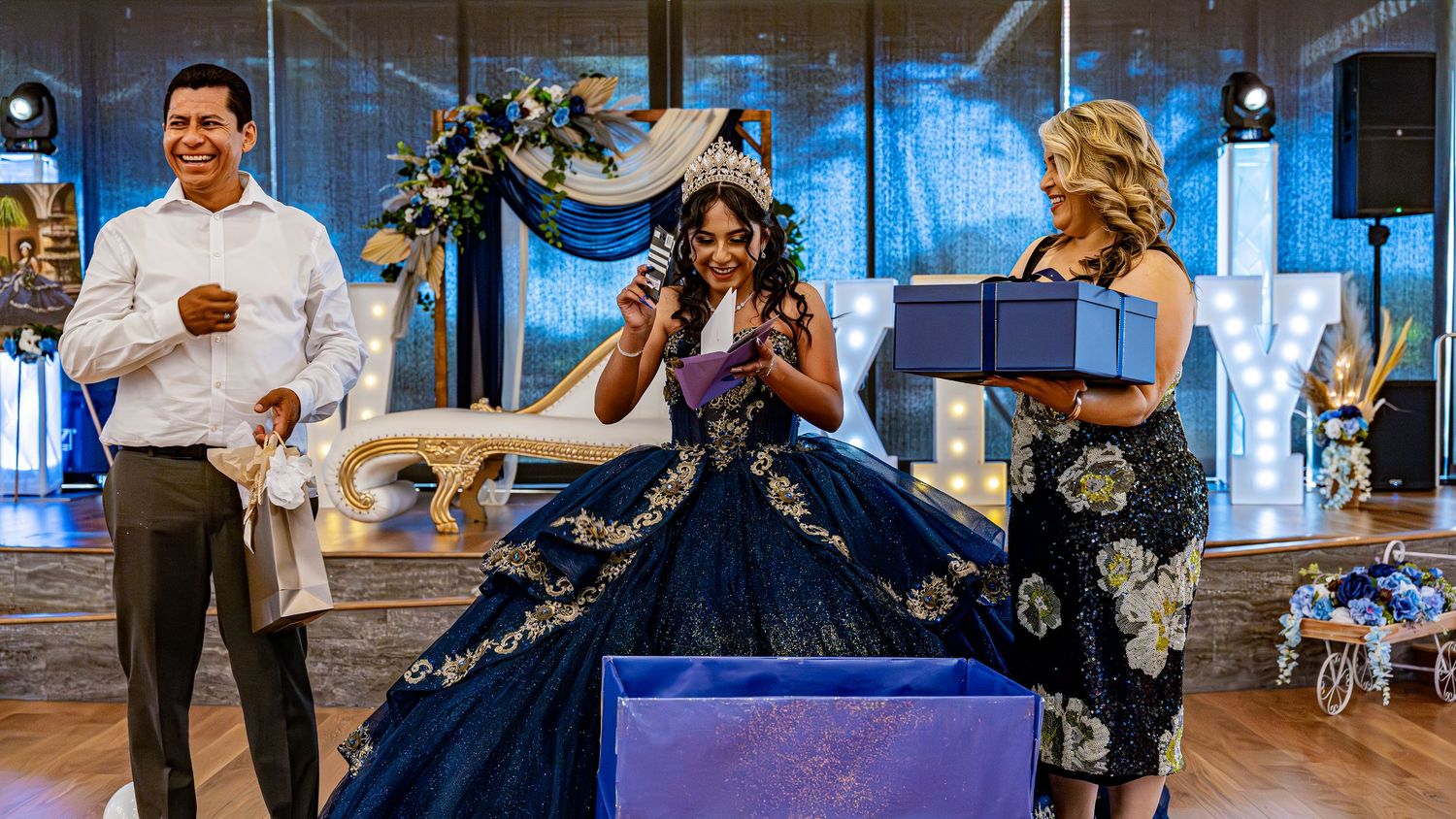 A series of celebration moments captured during a formal event with dancers in navy blue.