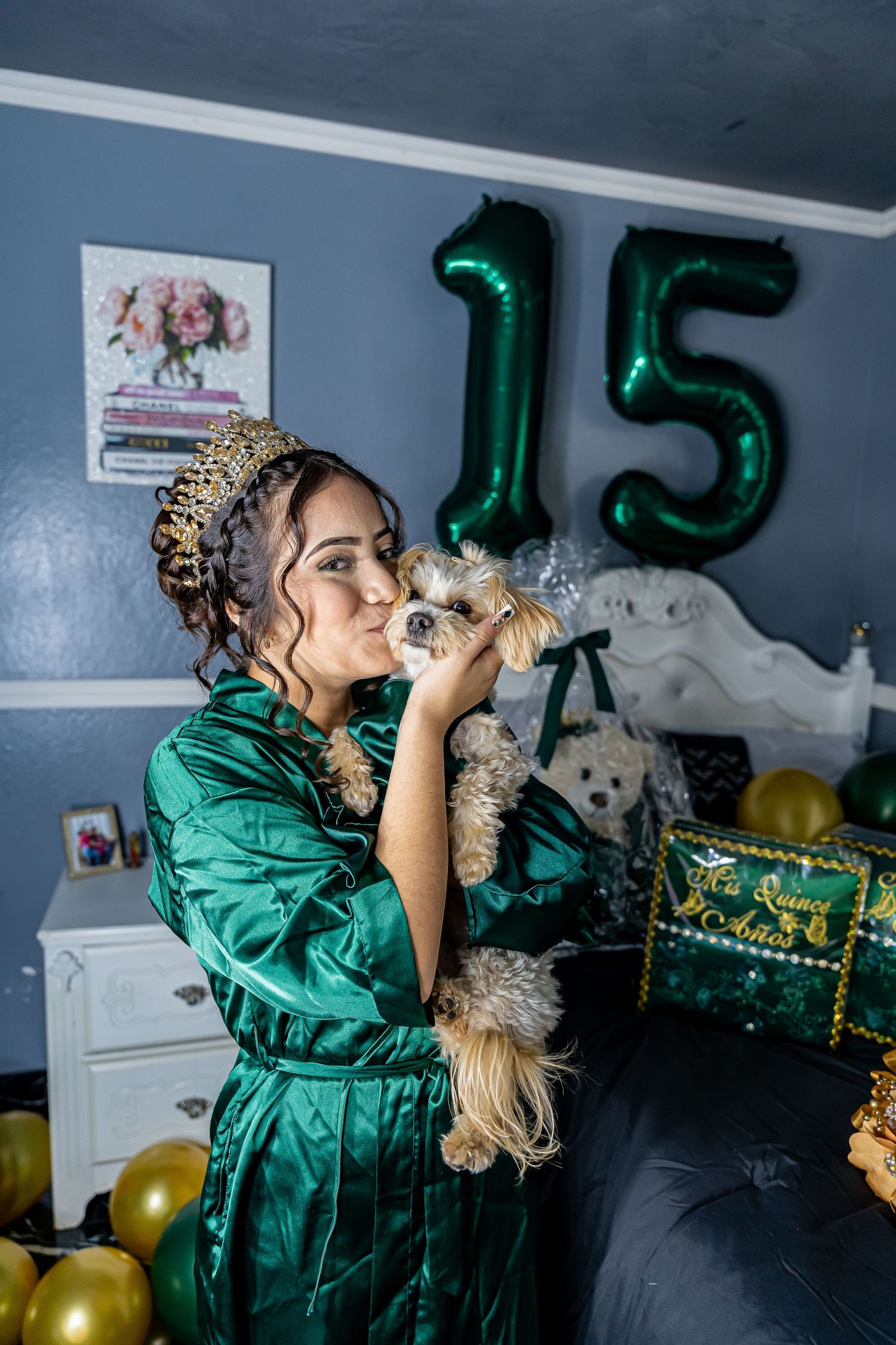 Celebration setup with green number 15 balloons and festive decorations.