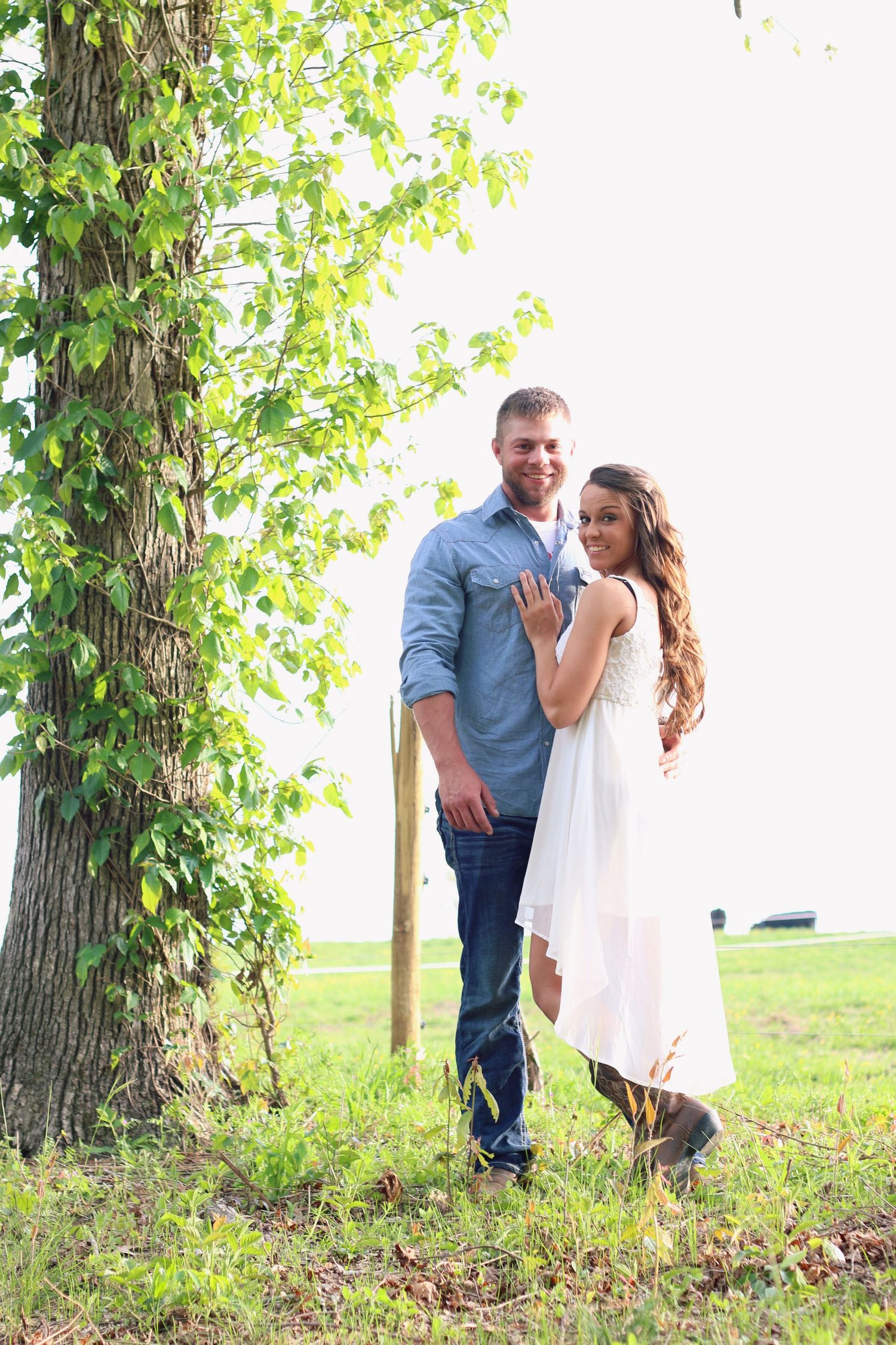 family portrait session photographed by Ross Image Works in Nashville Tennessee

family standing together during outdoor portrait session

n