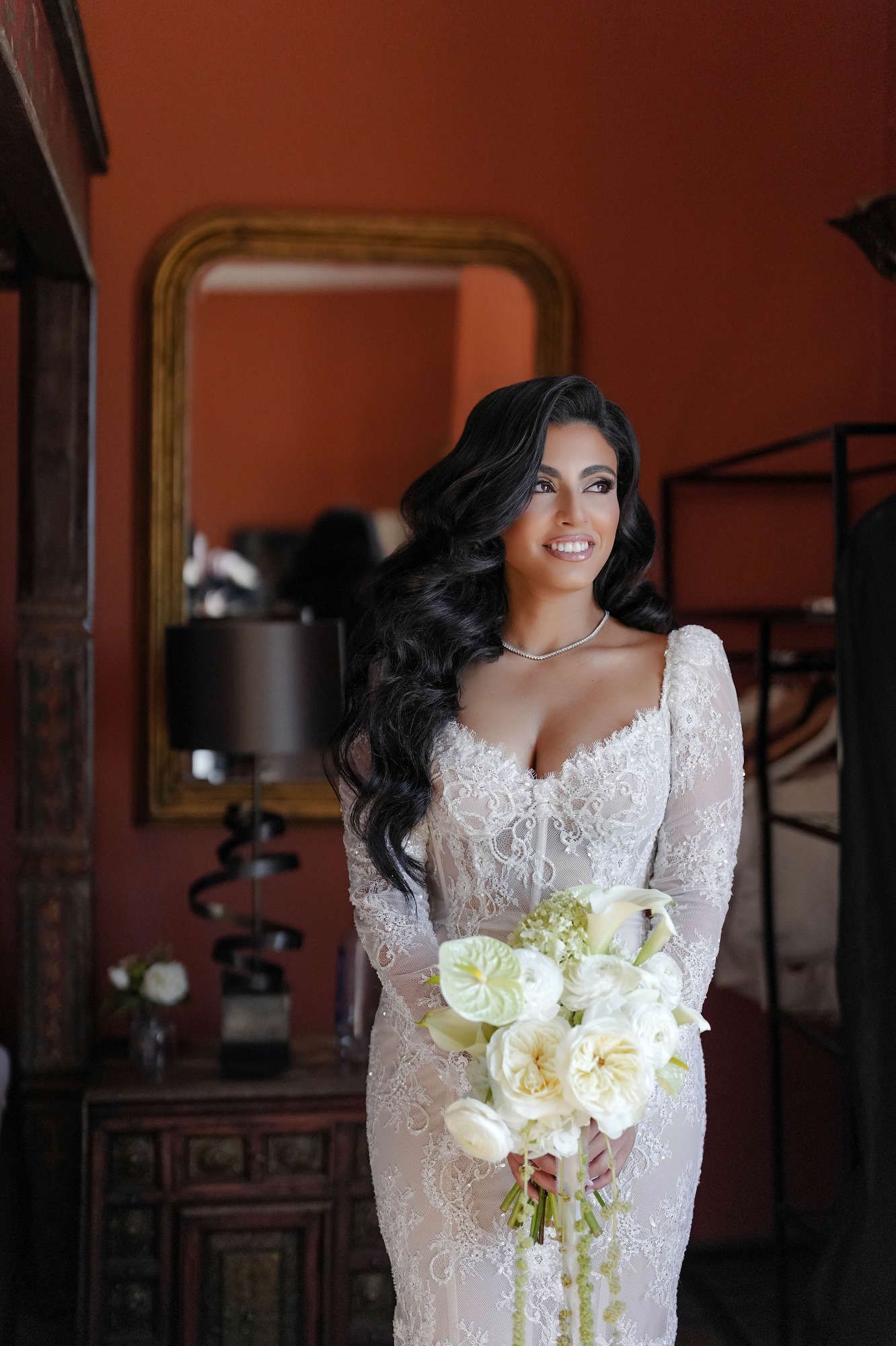 Brunette bride with a complete luxury look featuring voluminous waves and editorial makeup in Spain. High-end wedding beauty services.
