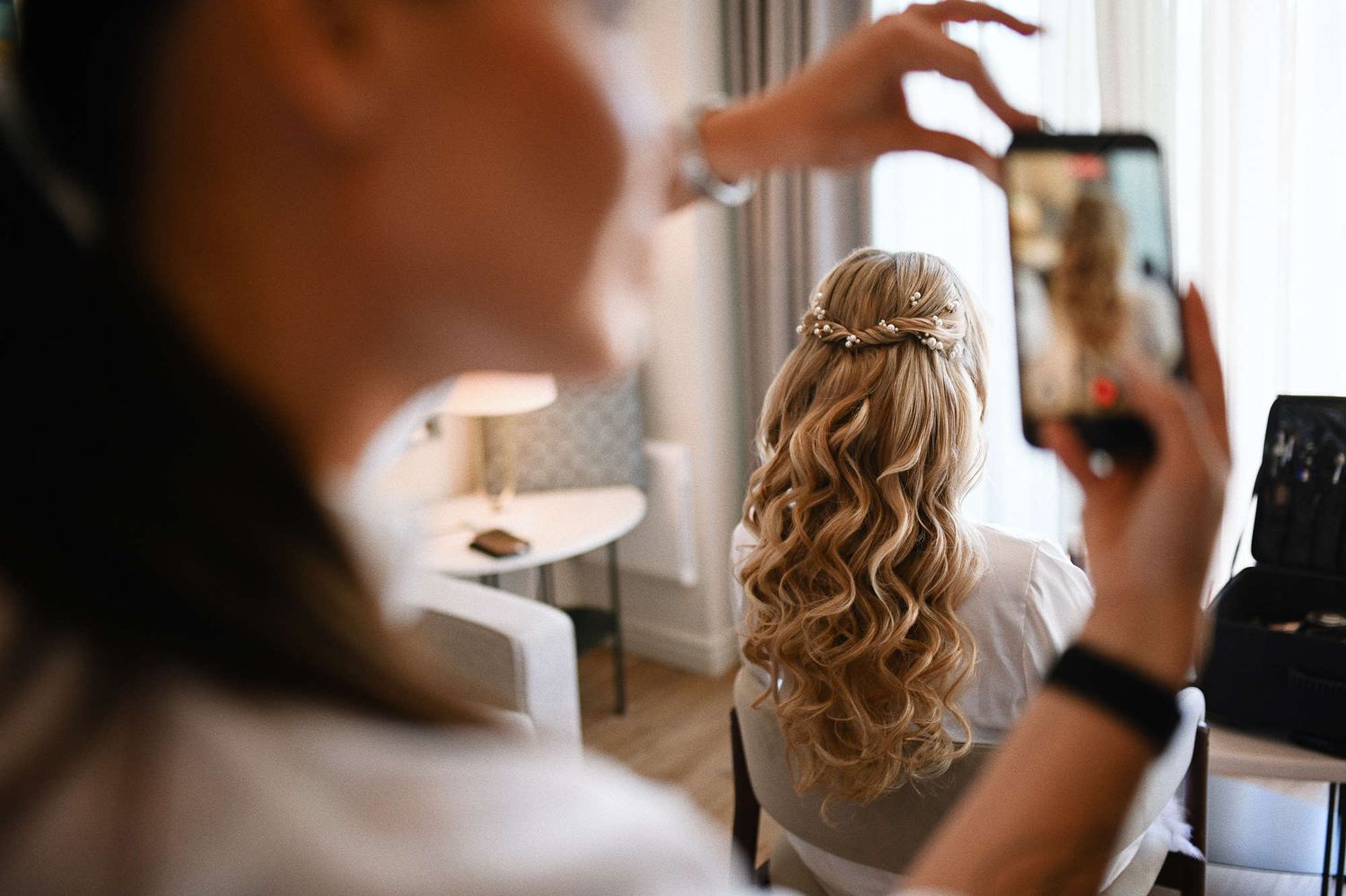 A close-up of the bride's completed wedding hairstyle at Finca El Senoret before putting on her bridal gown. Hair by stylist