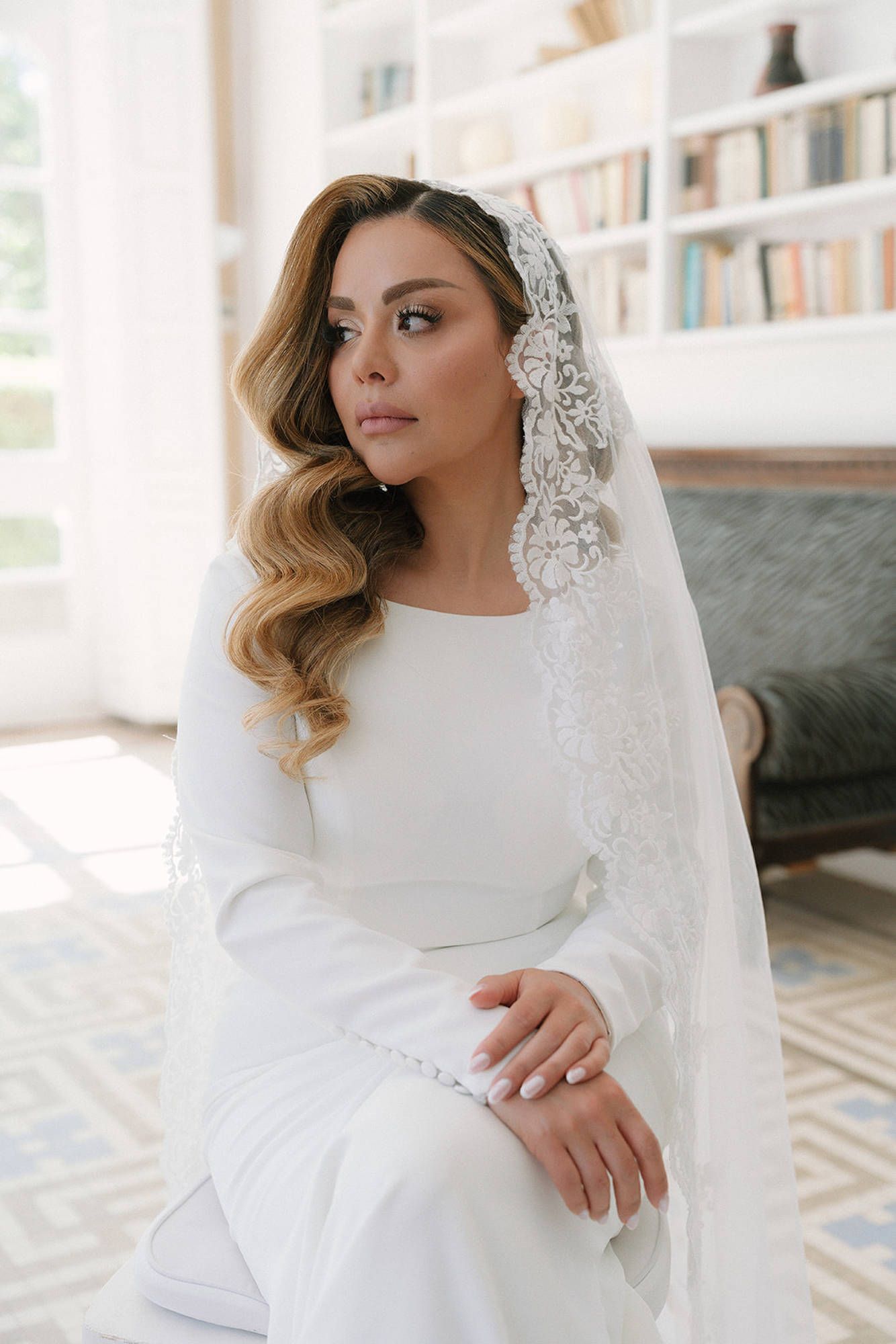 Stunning bridal portrait at Finca Torrefiel. Completed wedding makeup and hair look, ready for the upcoming ceremony in Spain.