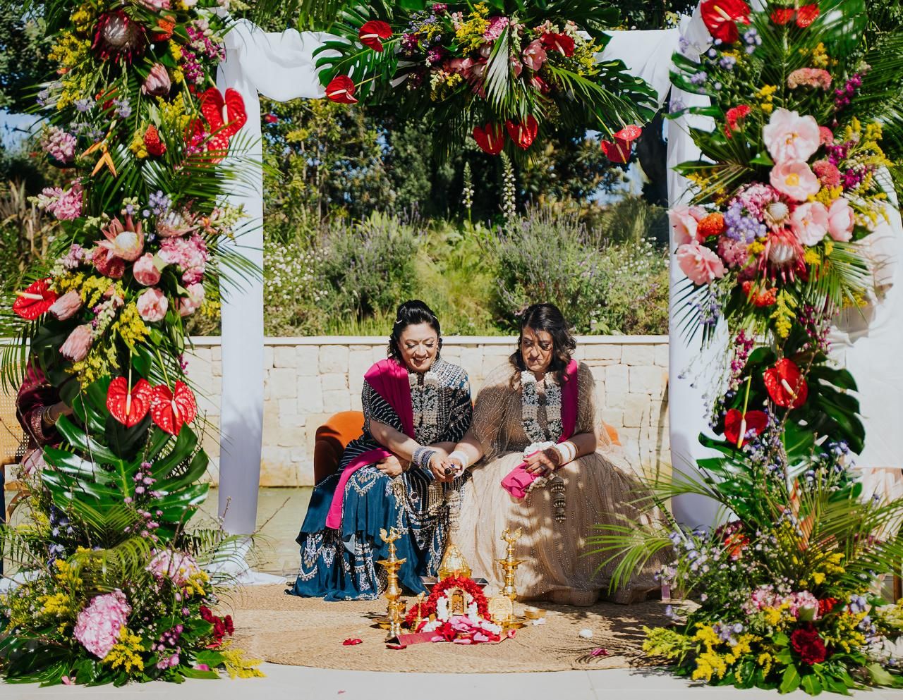 An intimate close-up wedding portrait of an Indian bride and groom with their foreheads touching at El Telar de Miguel Martí, Valencia, high