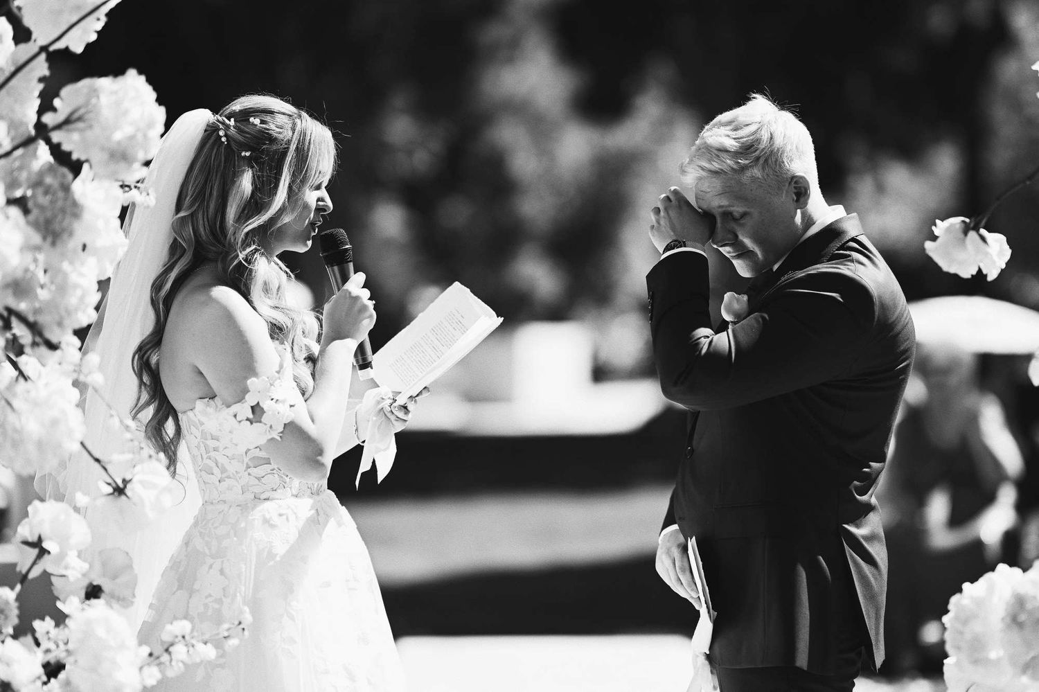 Emotional groom sheds a tear during vows as the bride gives her speech at Finca El Senoret wedding ceremony in Spain