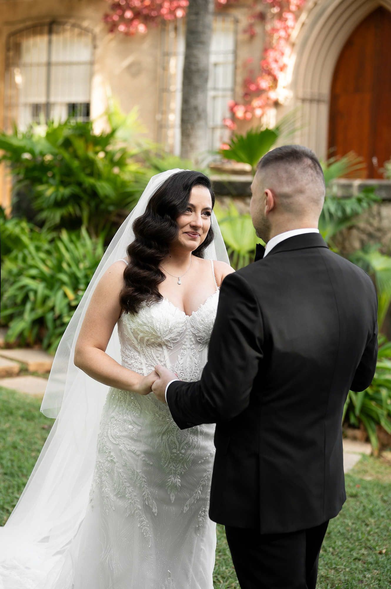 The emotional first look moment at Casa Santonja as the groom sees the bride in her wedding dress for the first time