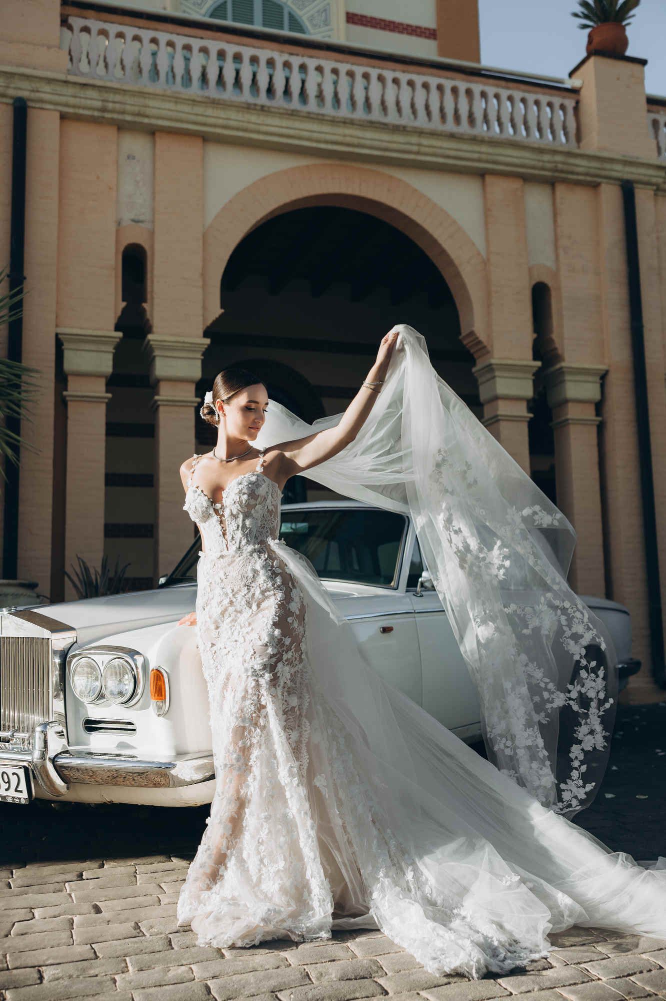 High-end bridal makeup and sophisticated hairstyle for an editorial-inspired destination wedding in Barcelona.