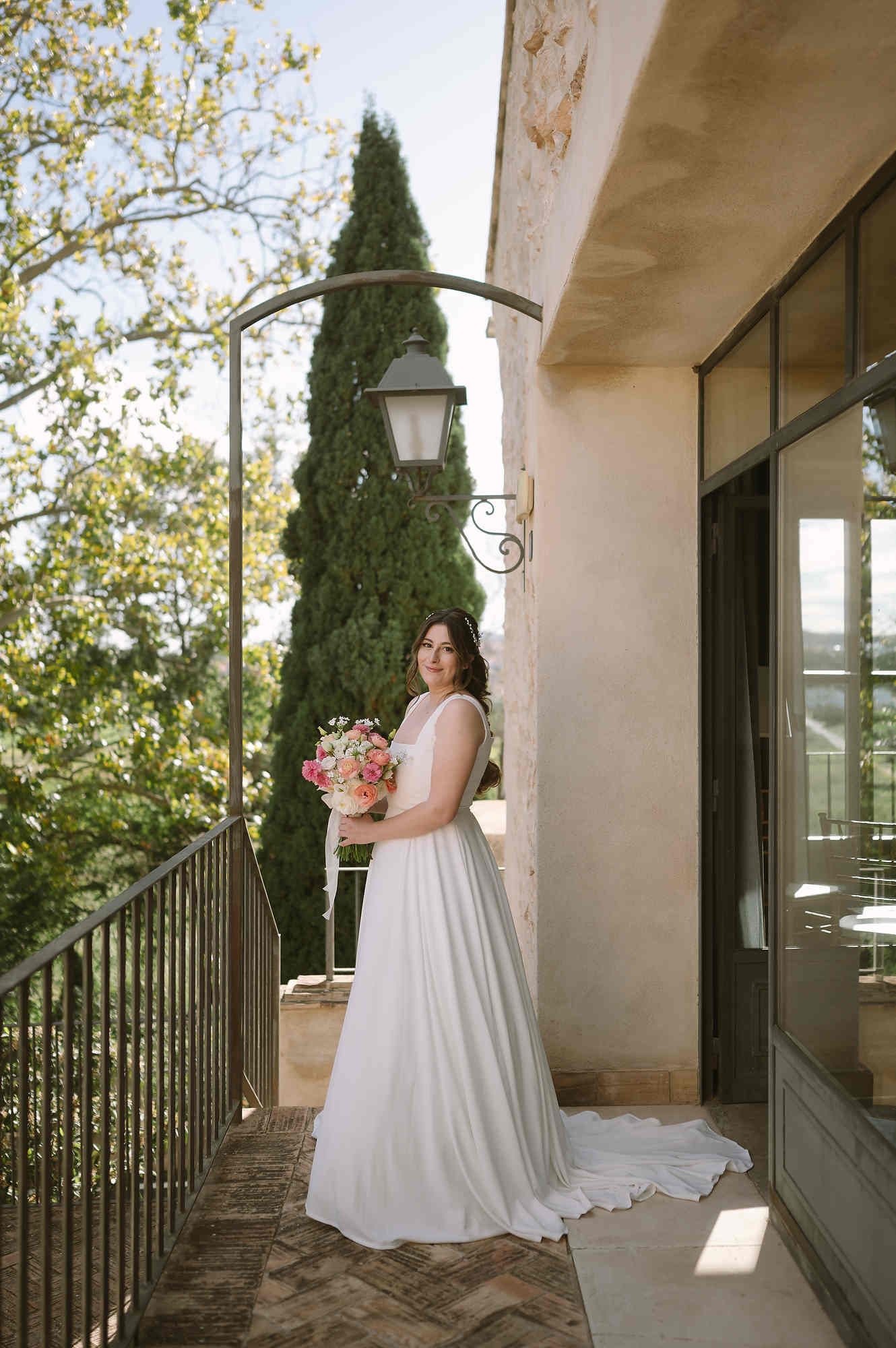 Elegant bridal portrait on the panoramic terrace of Mas d’Alzedo in Valencia.