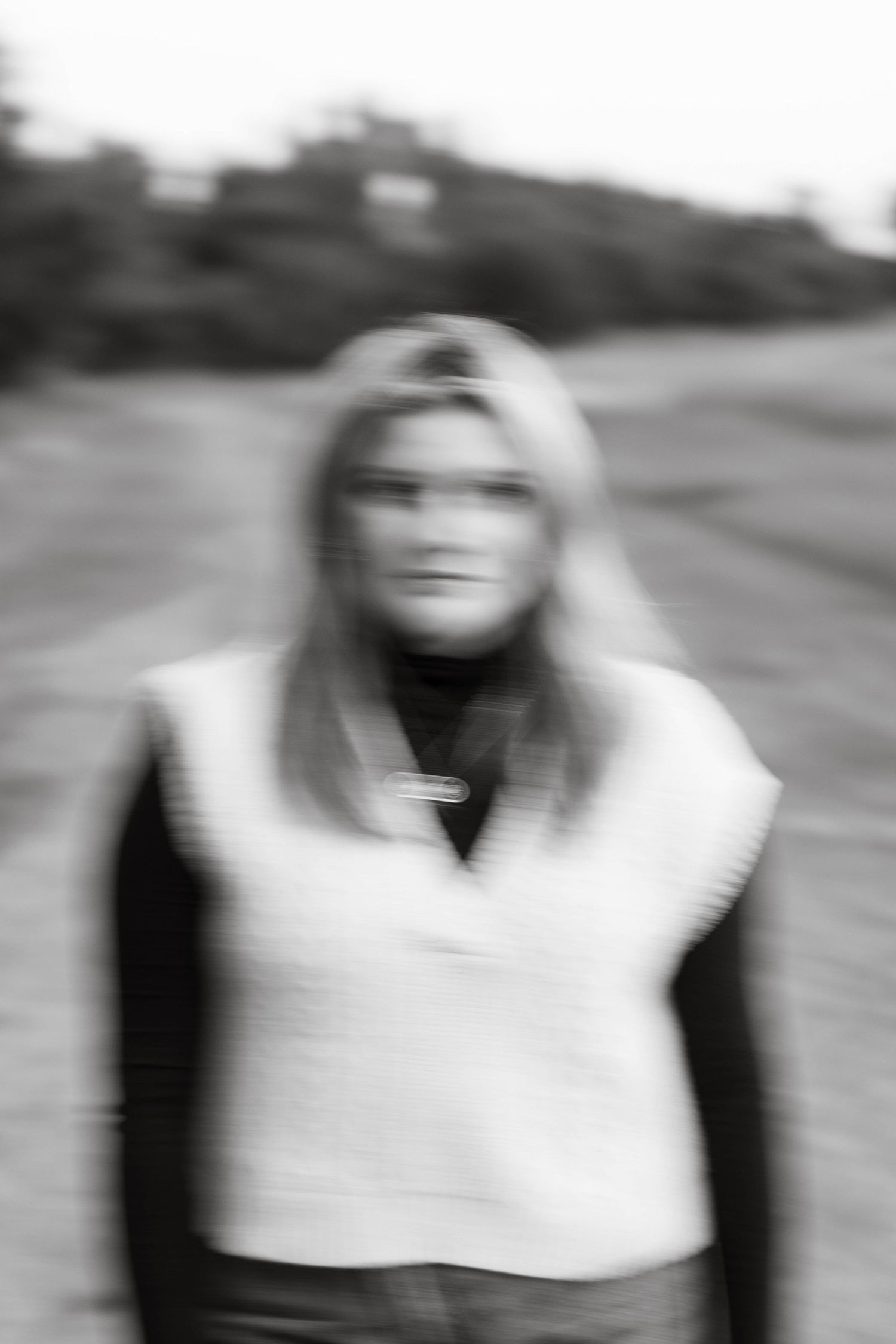 Ethereal black and white portrait with intentional motion blur.
