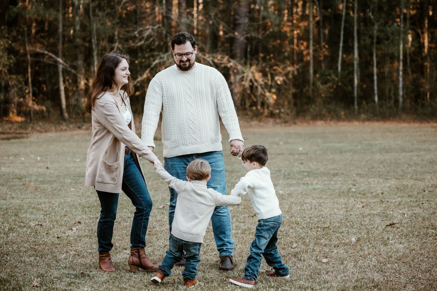 Candid family walking sequence captured in autumn outdoor setting.