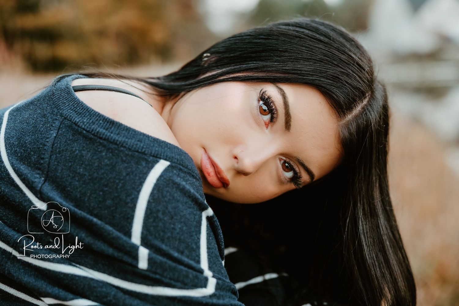 Artistic portrait series featuring dramatic lighting and poses.