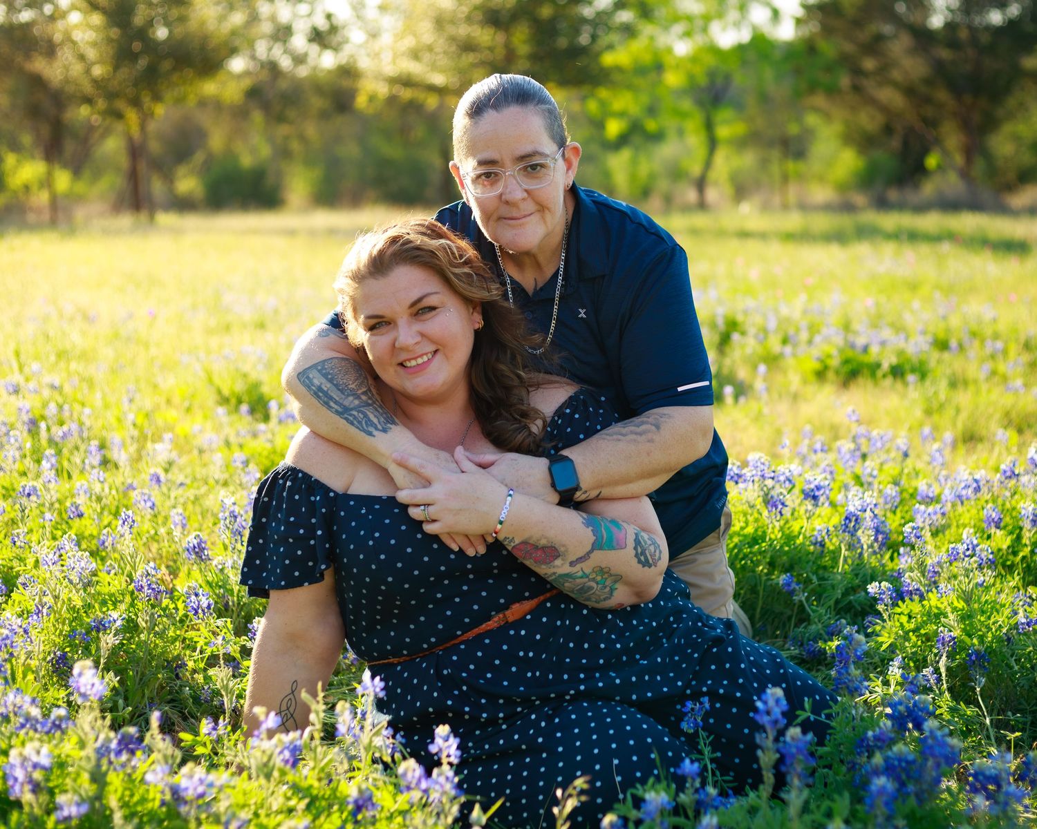 Couple portrait session in a Texas bluebonnet field near Marble Falls.