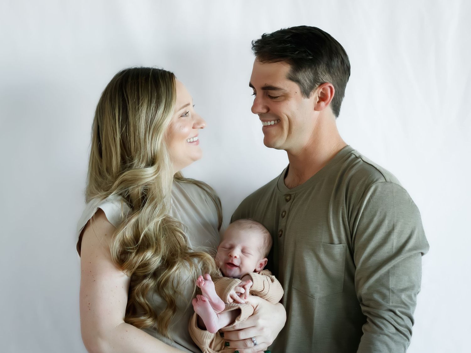 Lifestyle newborn and family photography portraits in Marble Falls, Texas.