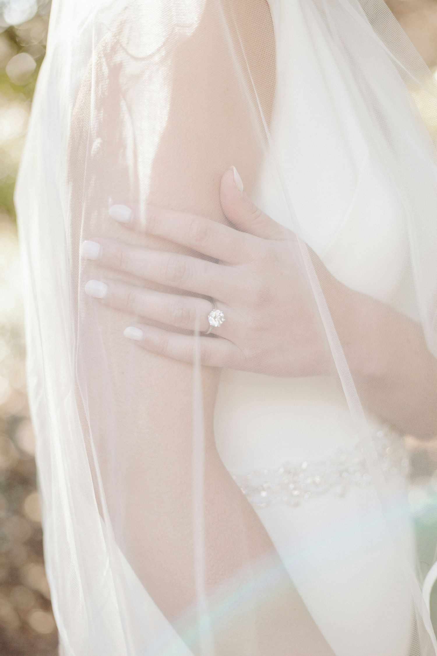 bride ring and veil detail