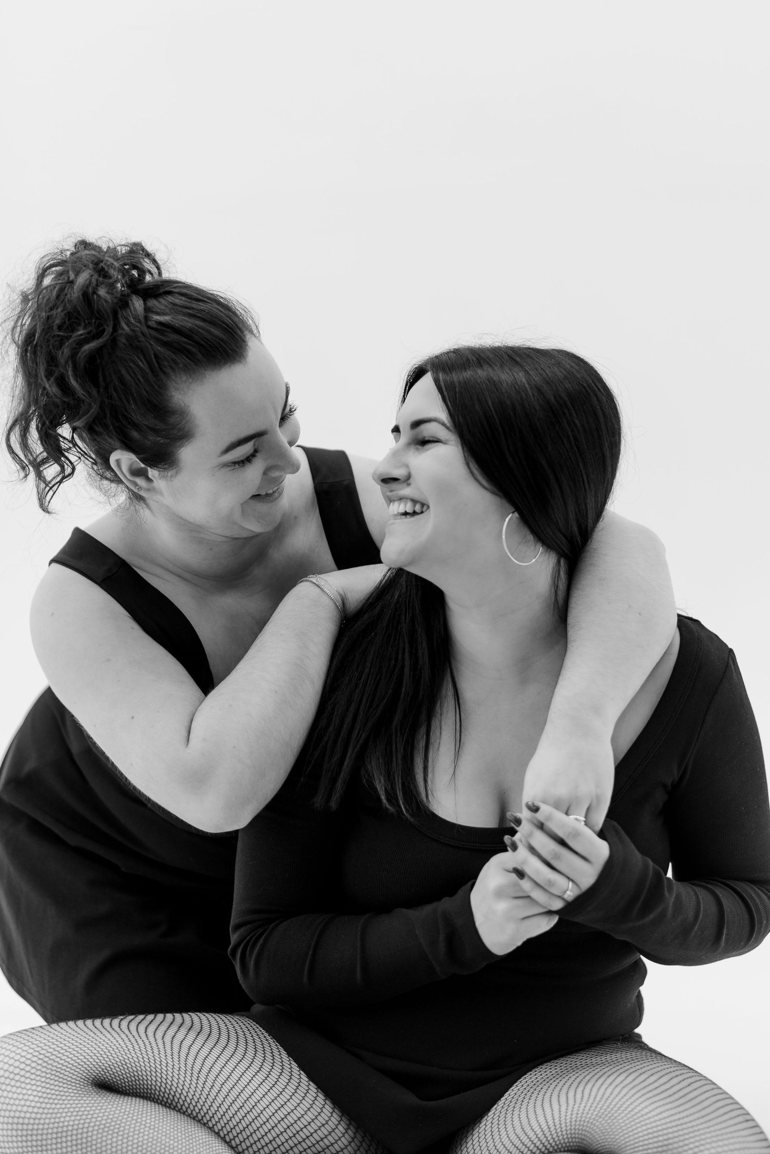 Artistic black and white portrait series showing intimate couple moments.
