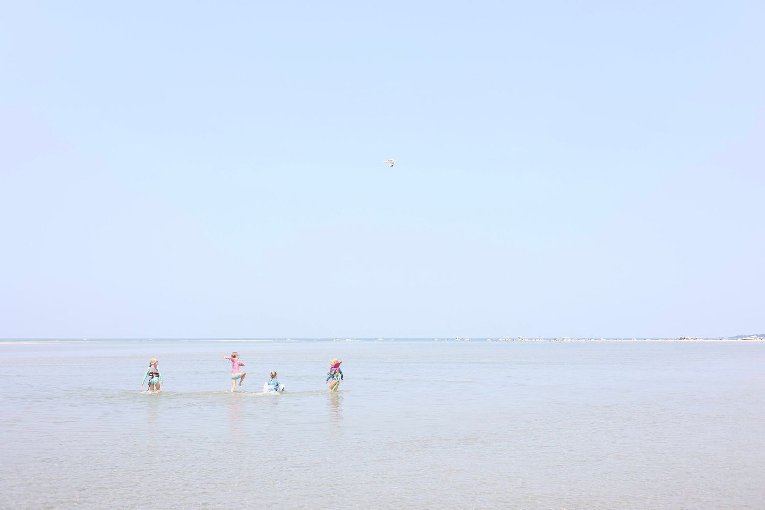 sandbar, children running, horizon, ocean, ipswich massachusetts